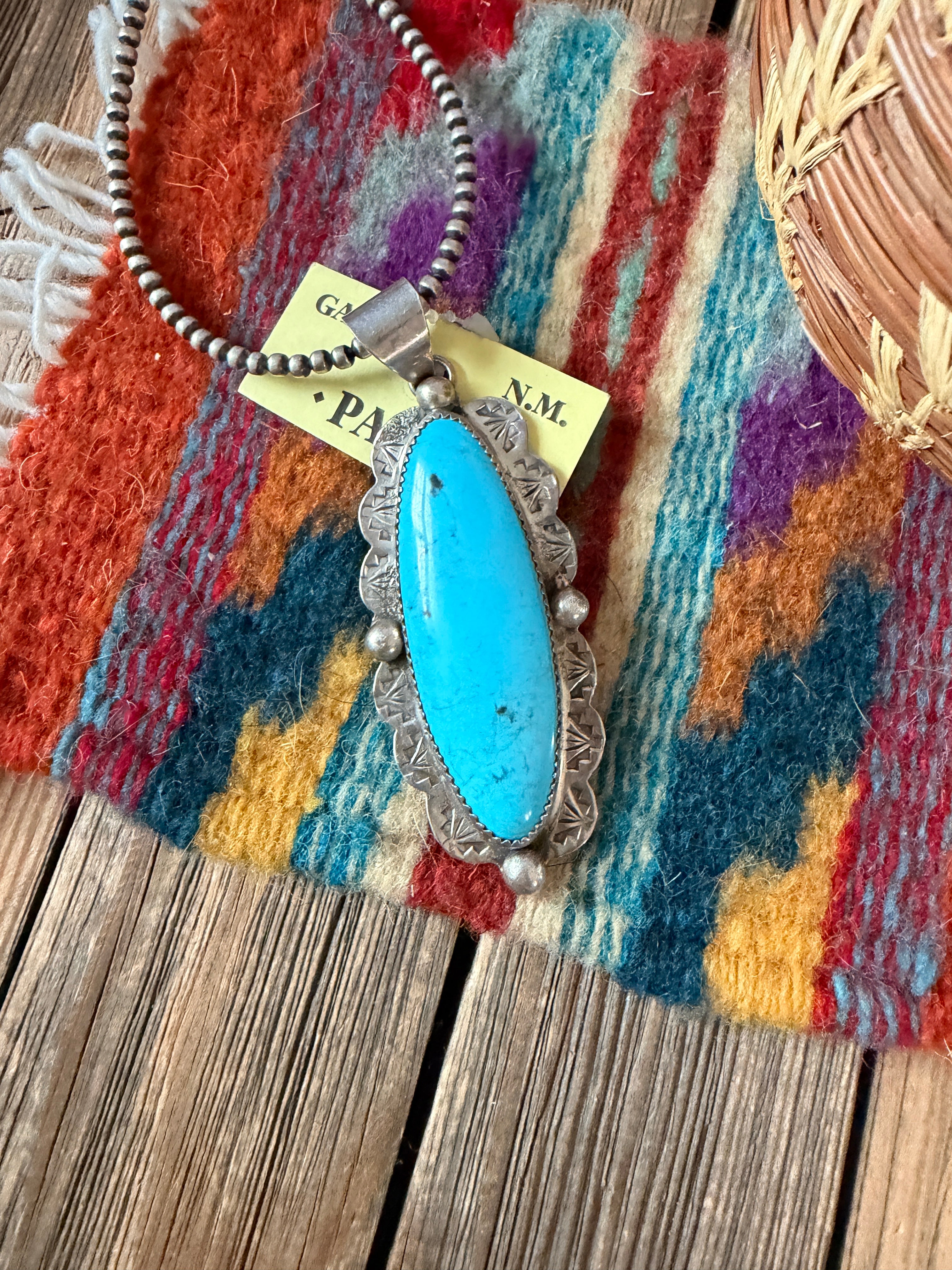 Old Pawn Handcrafted Turquoise and Sterling Silver Pendant