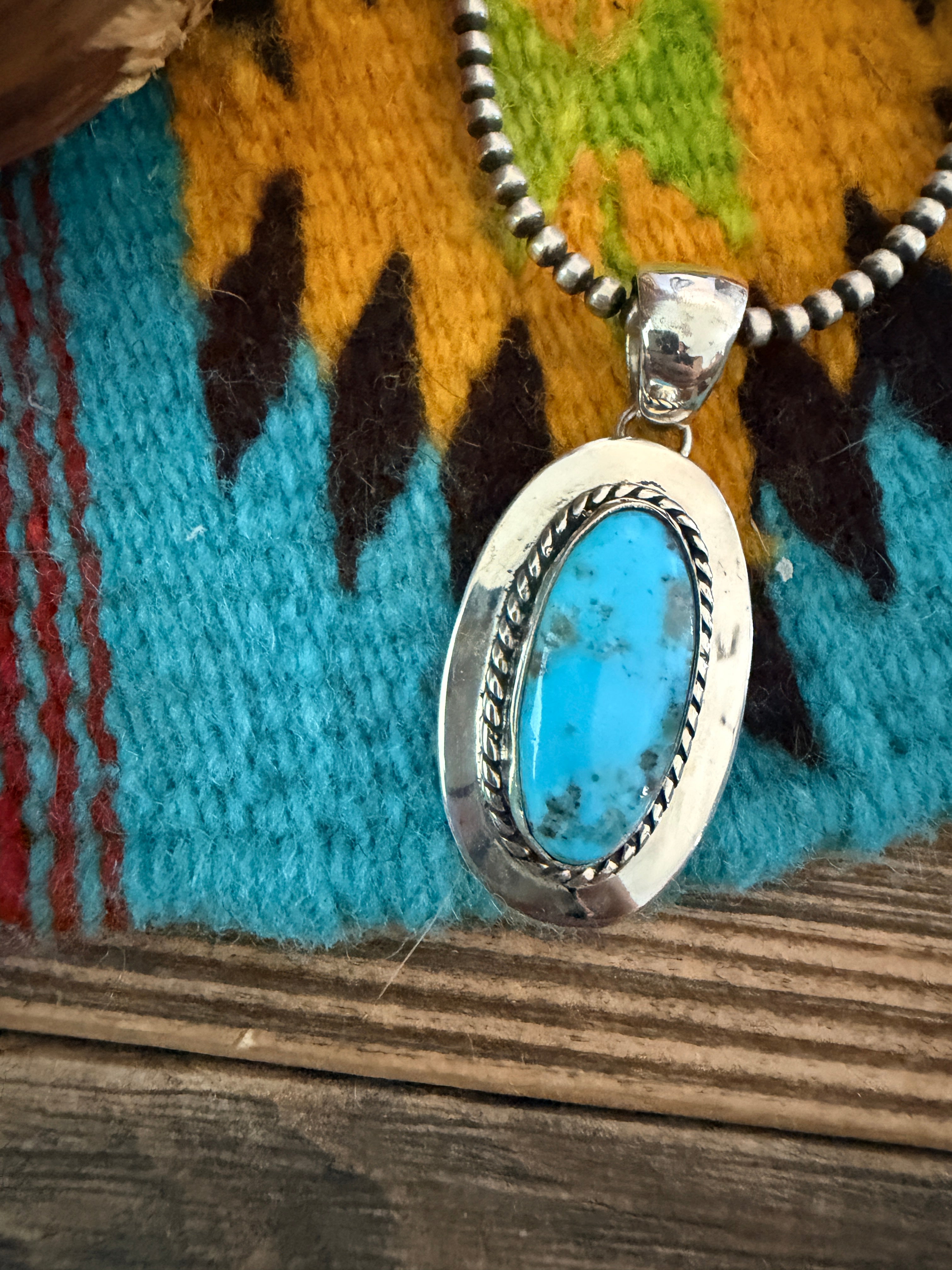 Handcrafted Sterling Silver and Turquoise Pendant by Wilford Begay