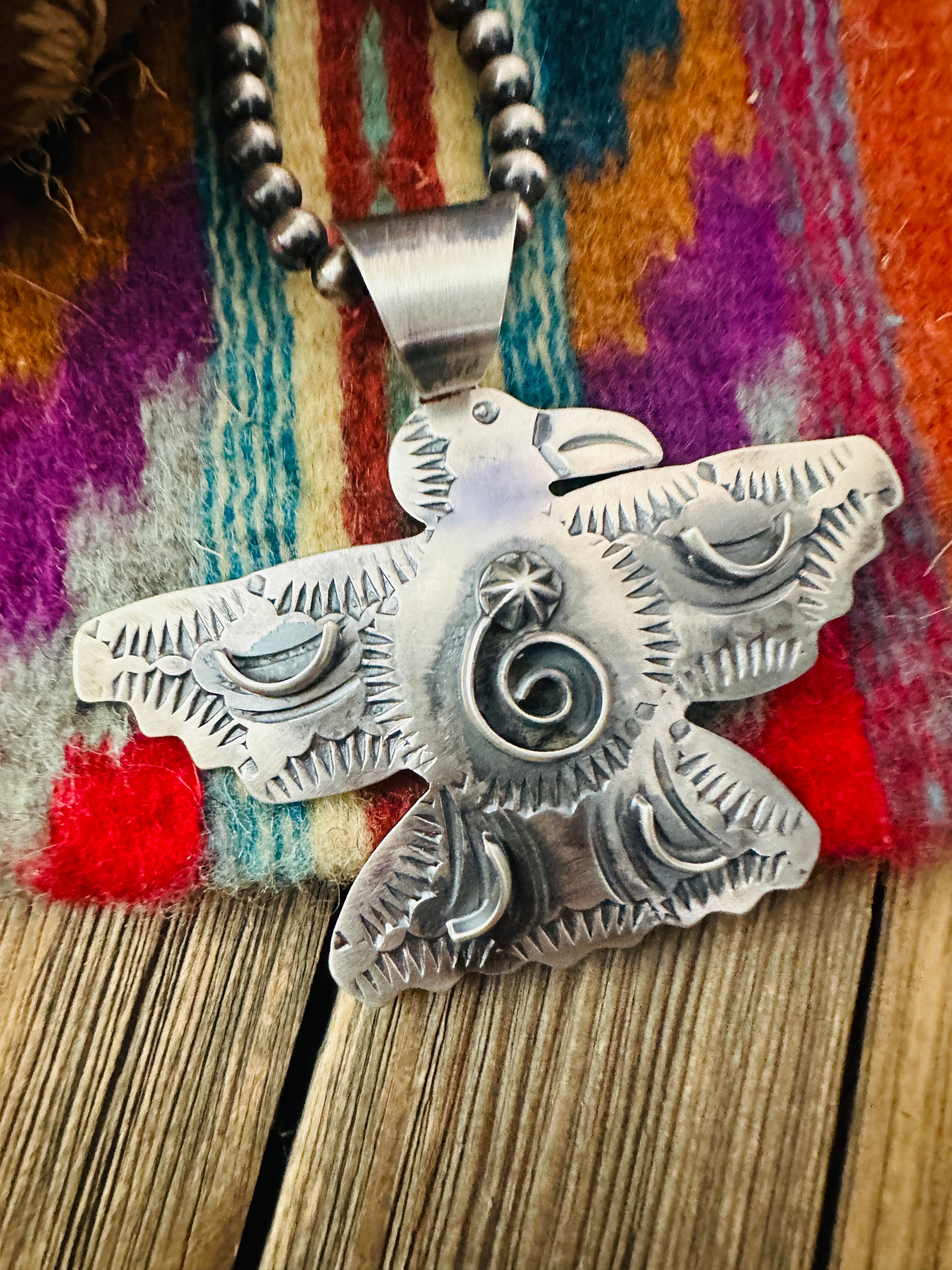 Handcrafted Sterling Silver Thunderbird Pendant by Chimney Butte