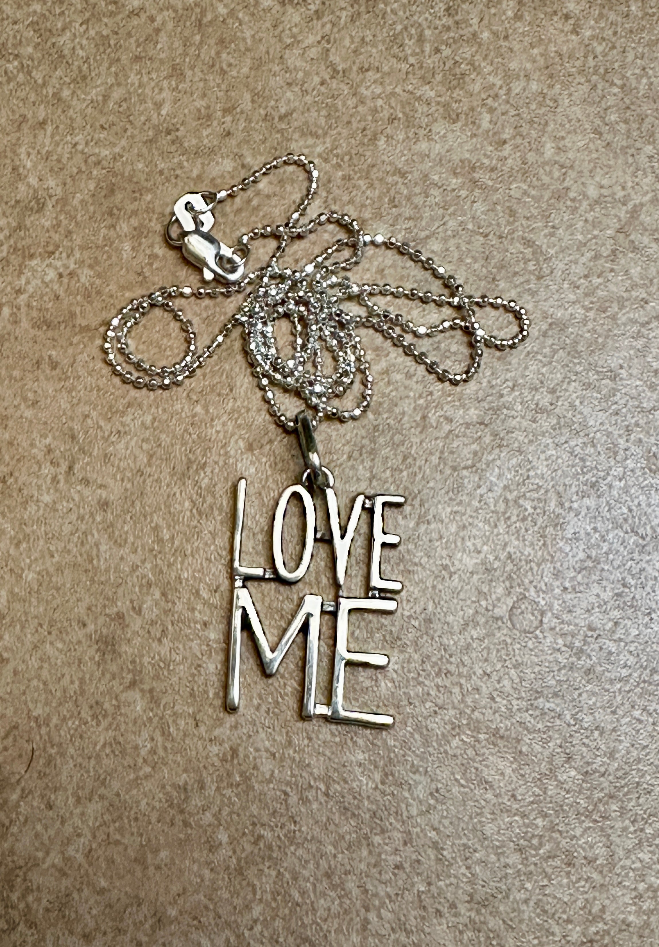 Love Me Pendant Necklace