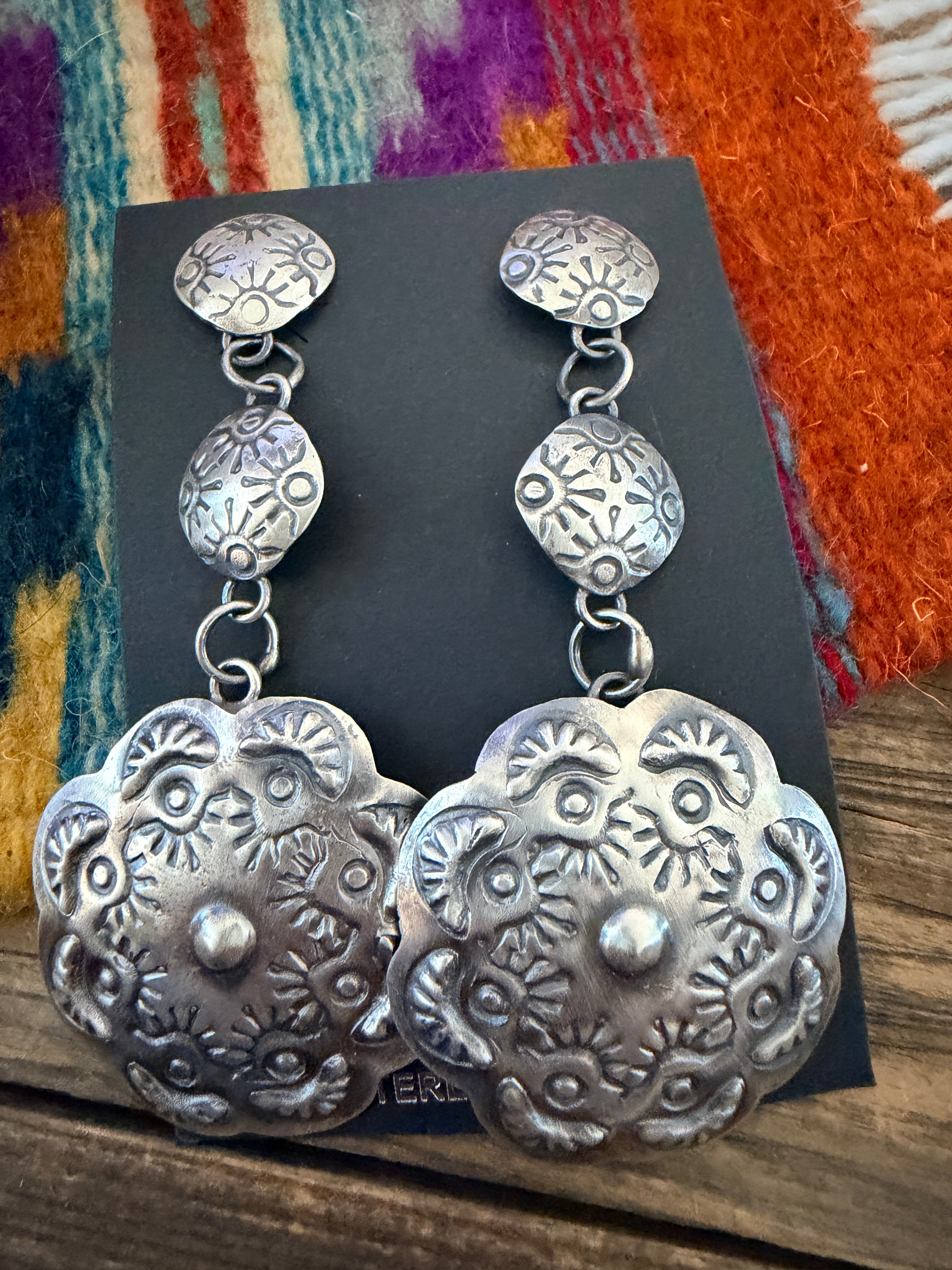 Handcrafted Sterling Silver Concho Dangle Earrings by Gabrielle Yazzie