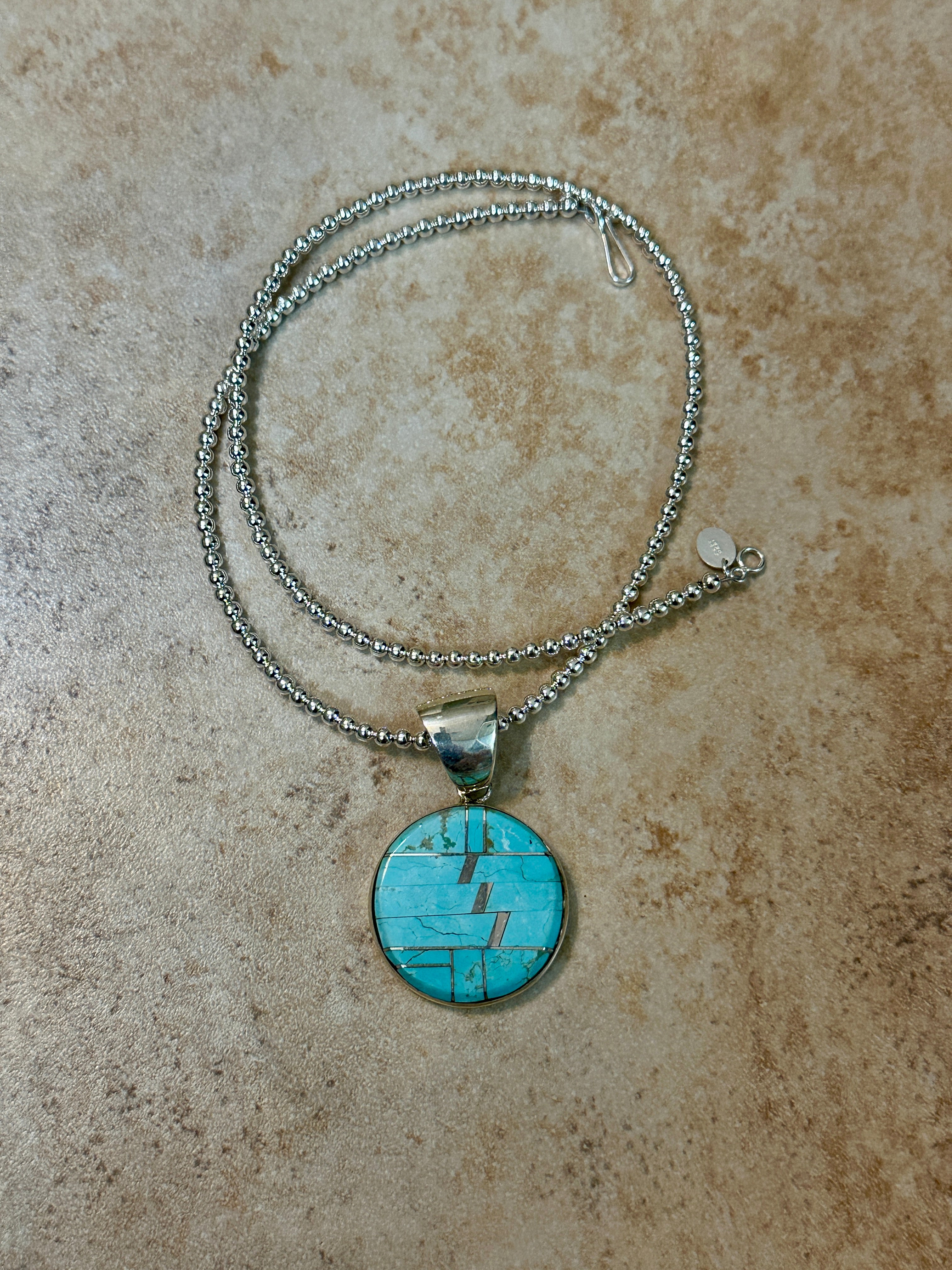 Handcrafted Turquoise #8 Circle Pendant