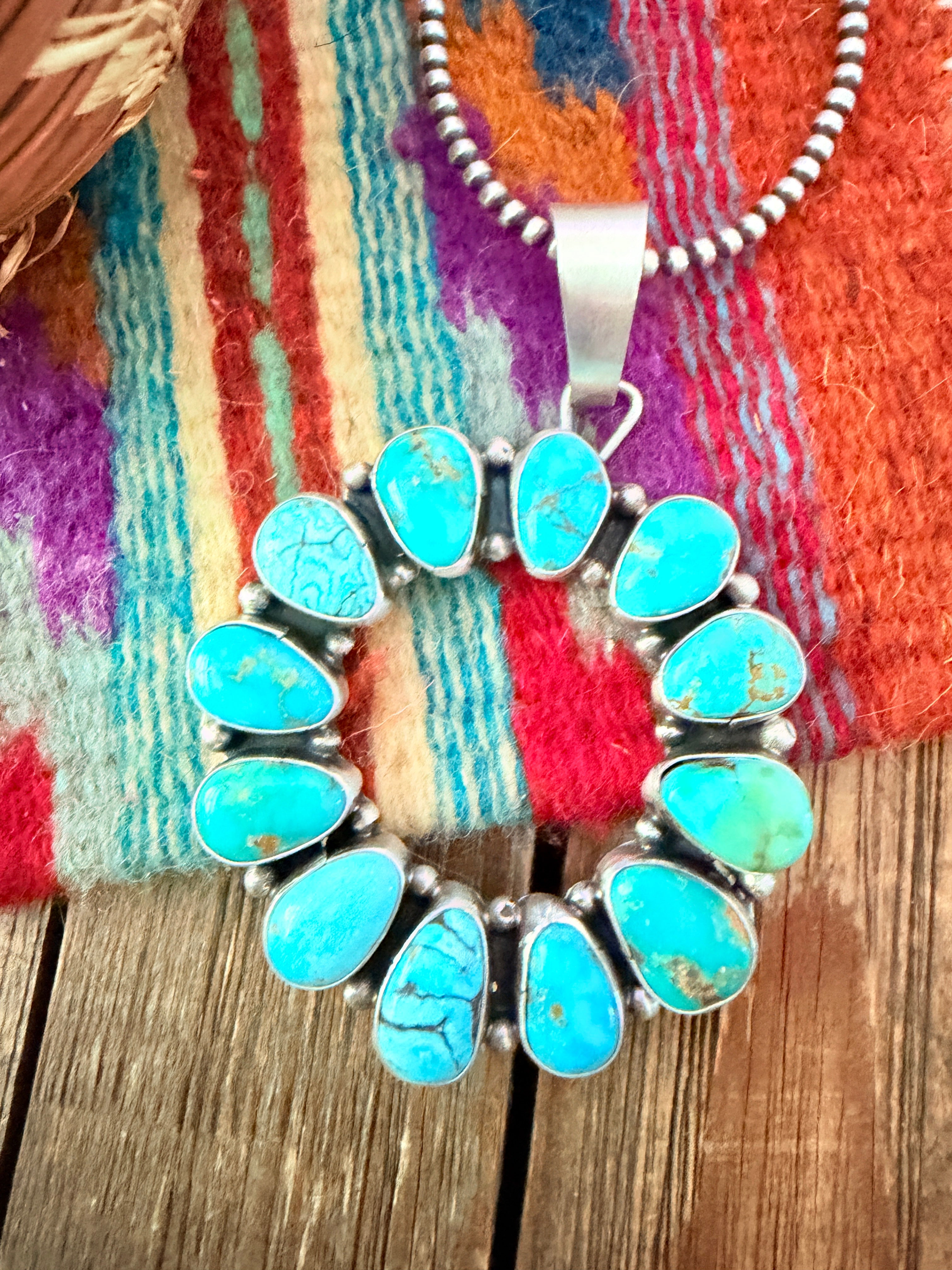 Handcrafted Sterling Silver & Turquoise Pendant by Travis Jim