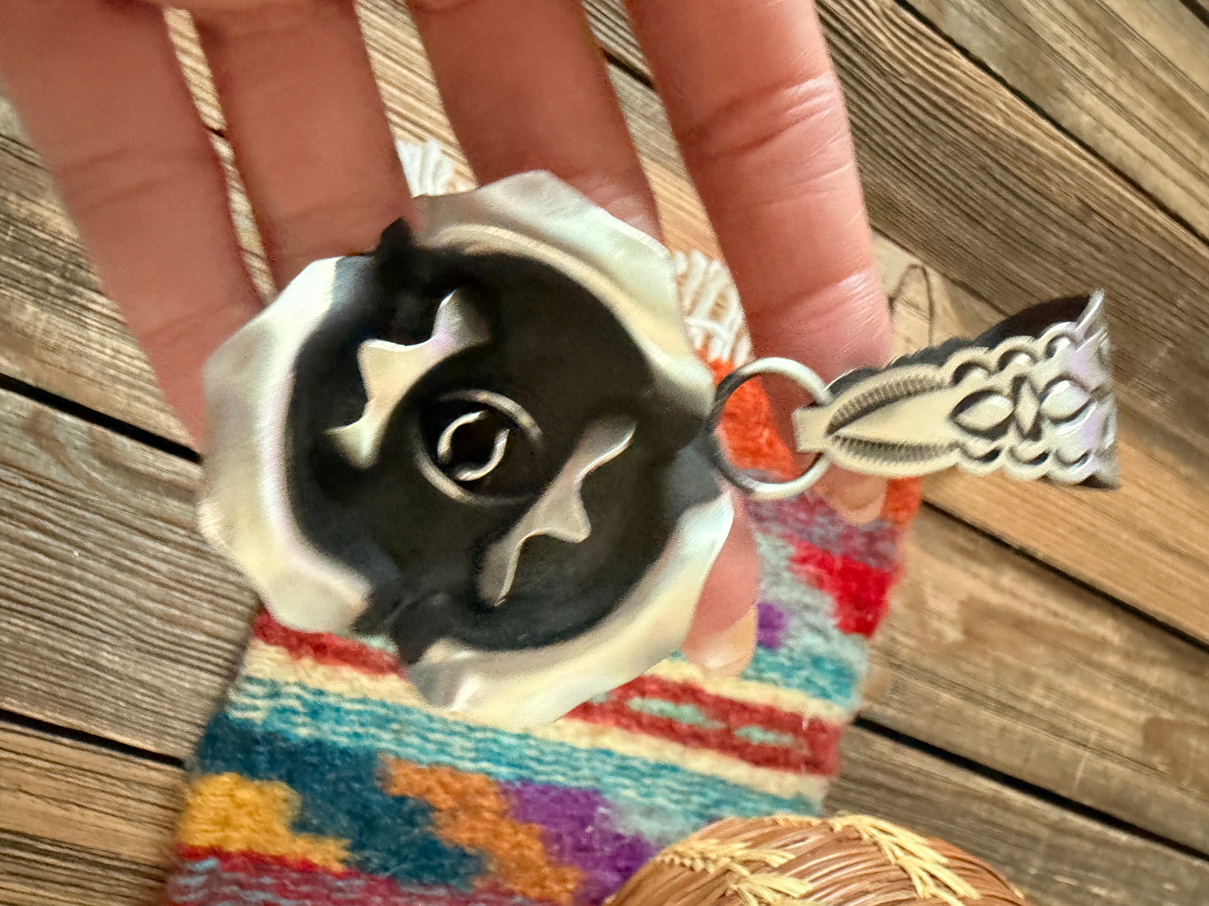 Handcrafted Sterling Silver Rose Pendant by Leander Tahe