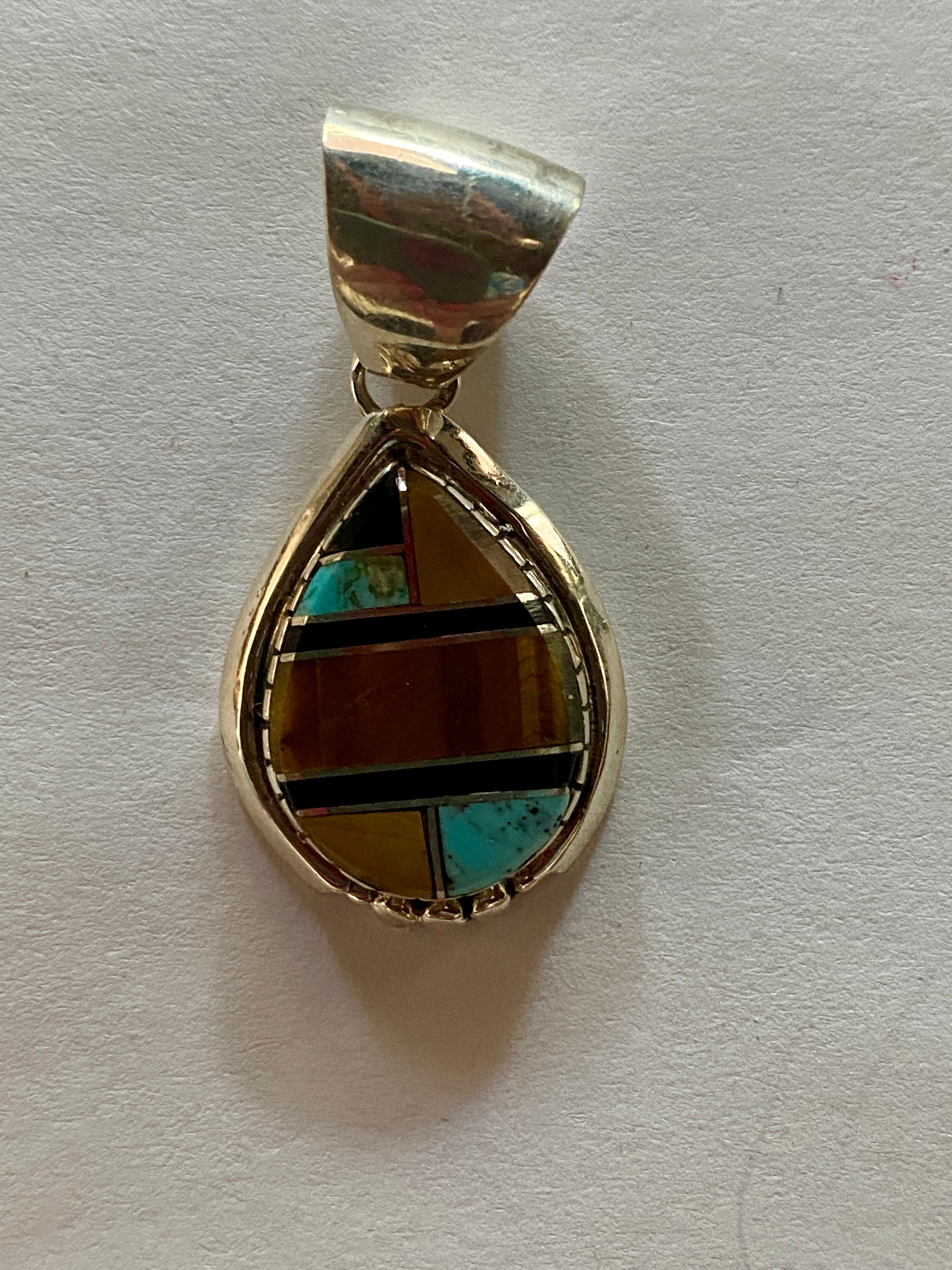 Handcrafted Turquoise petrified wood Pendant