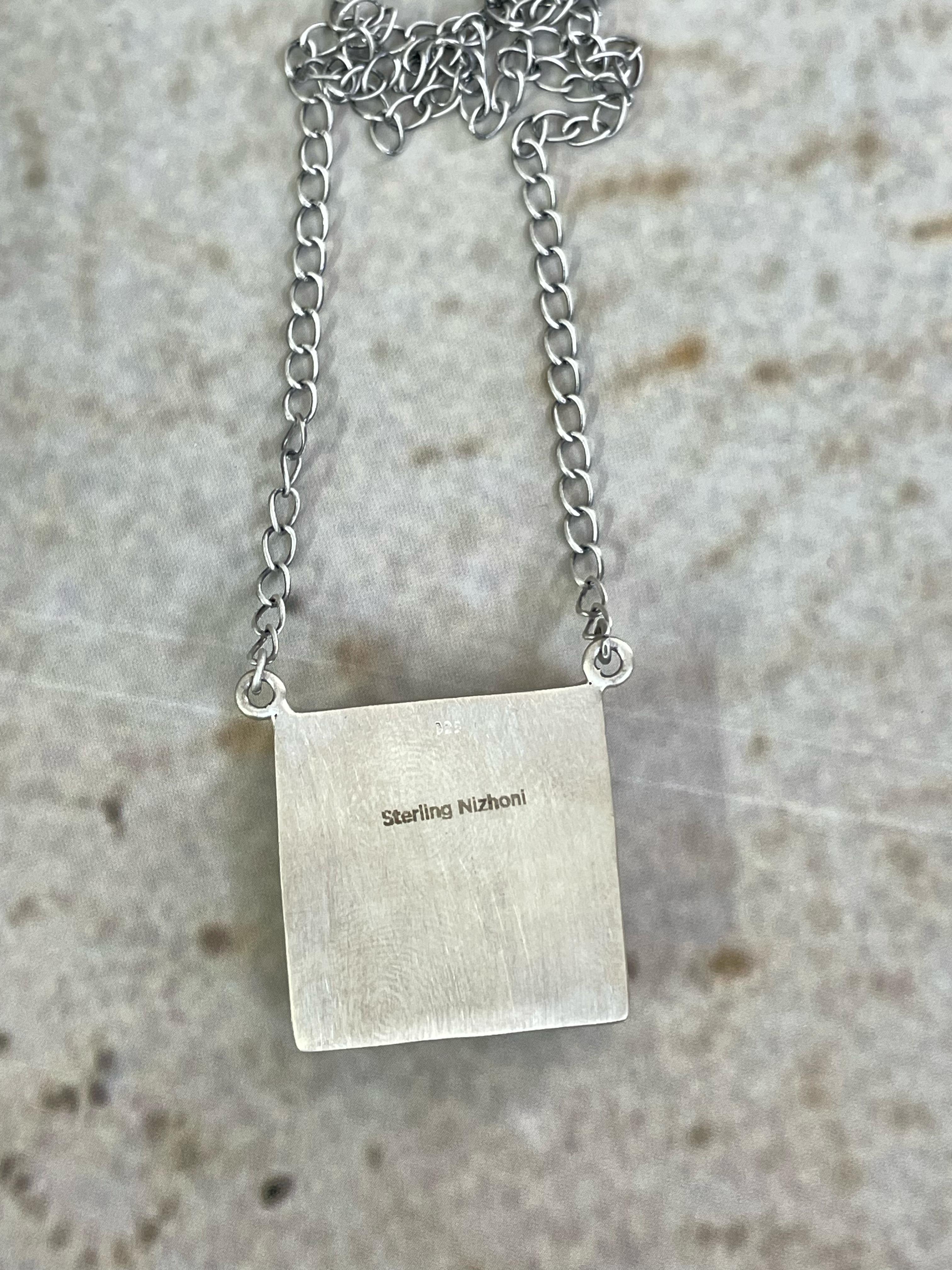 Handmade Sterling Silver White Buffalo Turquoise Necklace with Signed Nizhoni