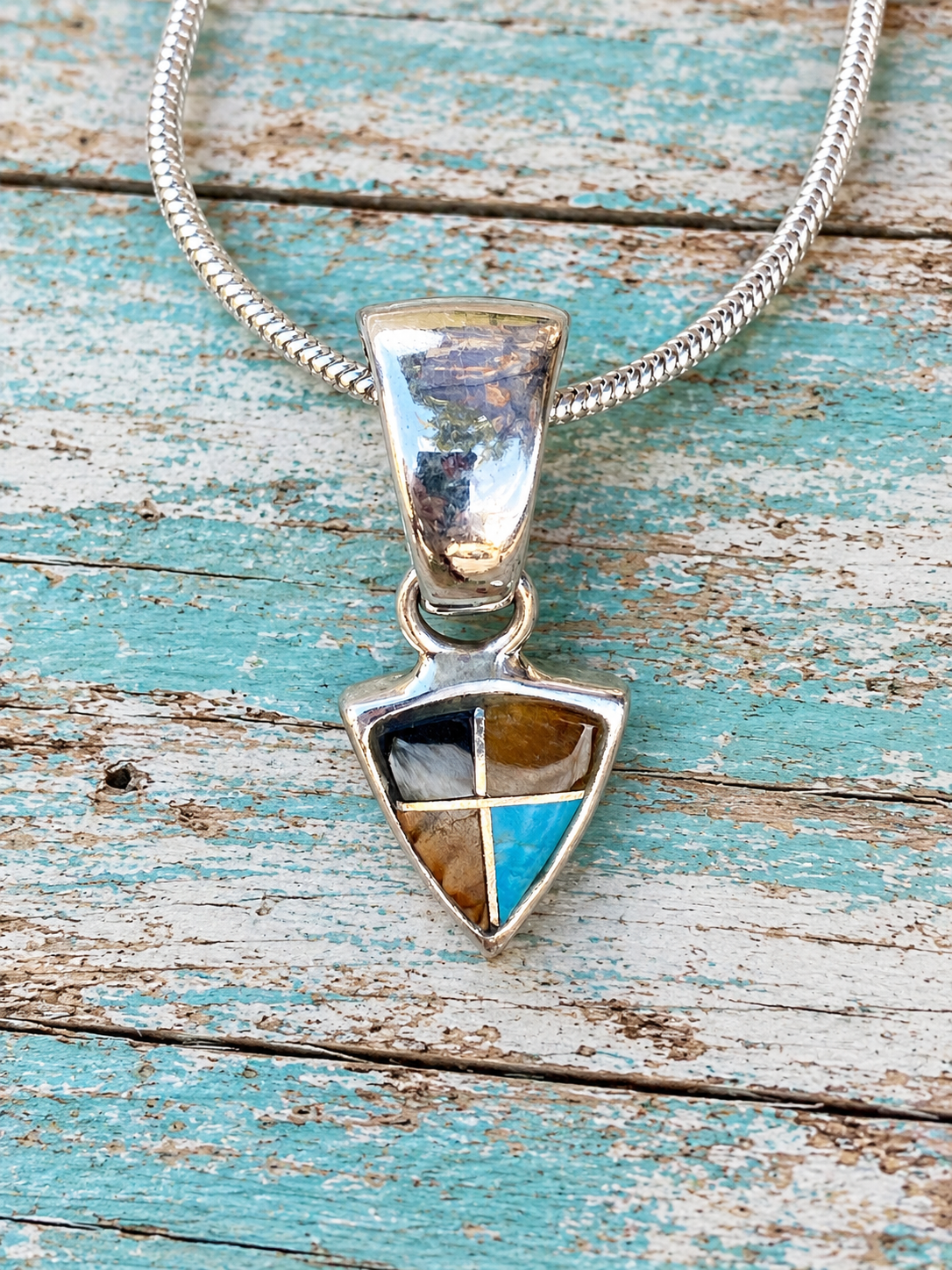 Handcrafted Turquoise, Onyx, Petrified Wood Triangle Pendant