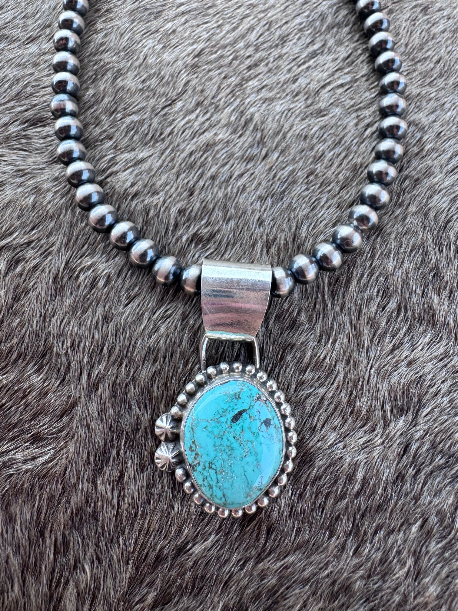Handmade Sterling Silver Carico Lake Turquoise Stamped Ball Pendant by Roaming Buffalo