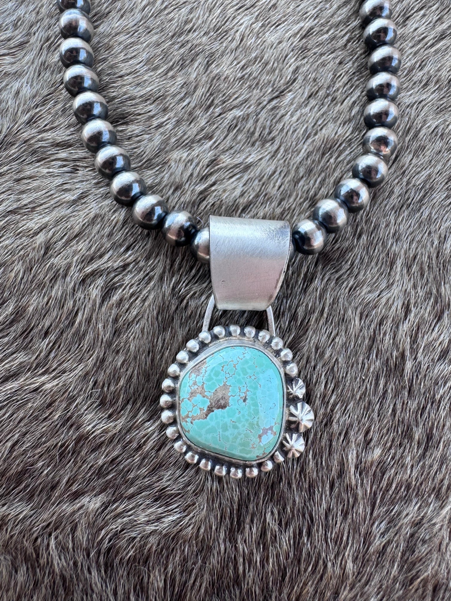 Handmade Sterling Silver Carico Lake Turquoise Ball Pendant by Roaming Buffalo