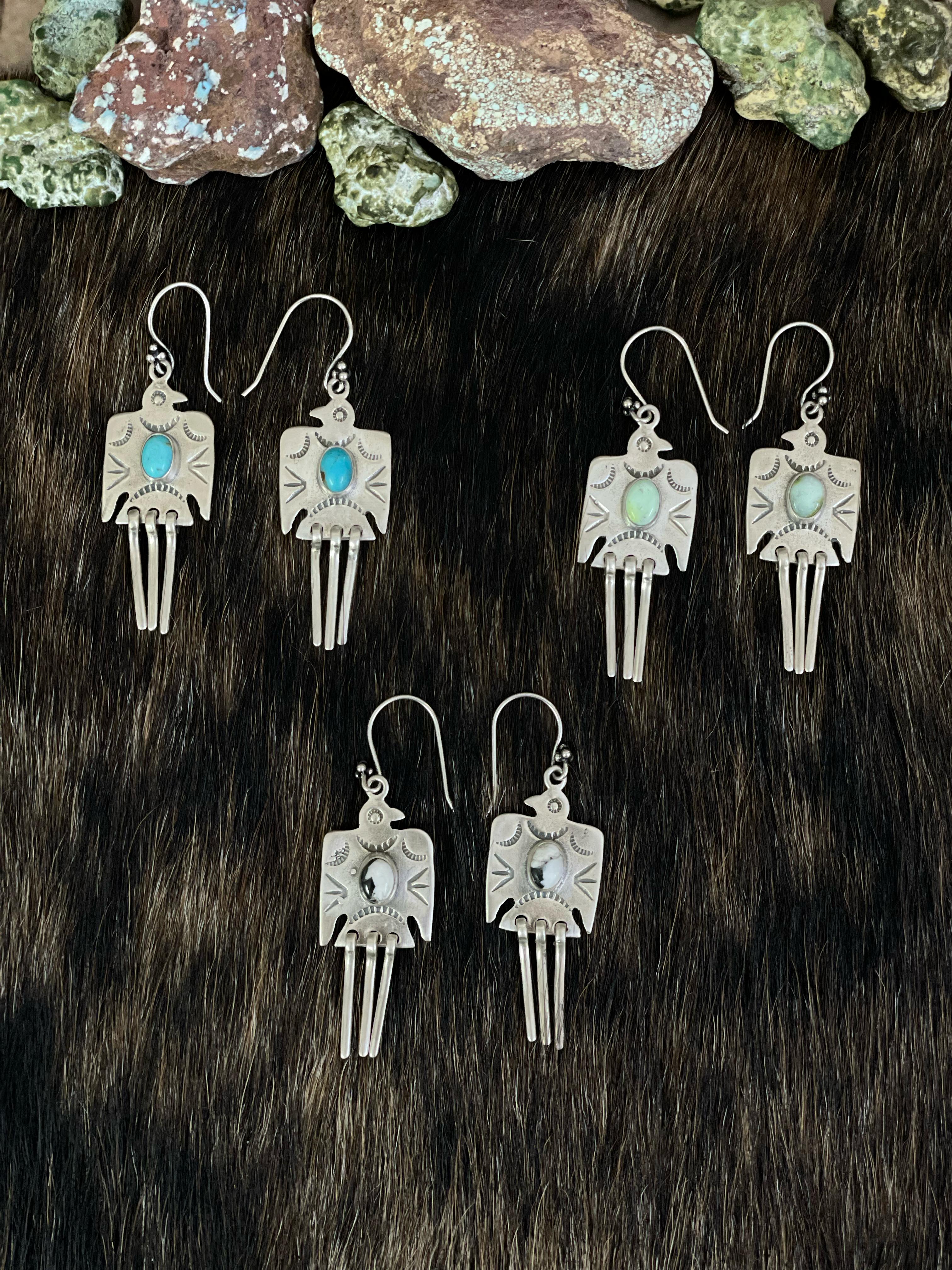 Handmade Sterling Silver White Buffalo, Kingman, Paloma Turquoise Dangle Thunder Bird Earrings with Signed Nizhoni