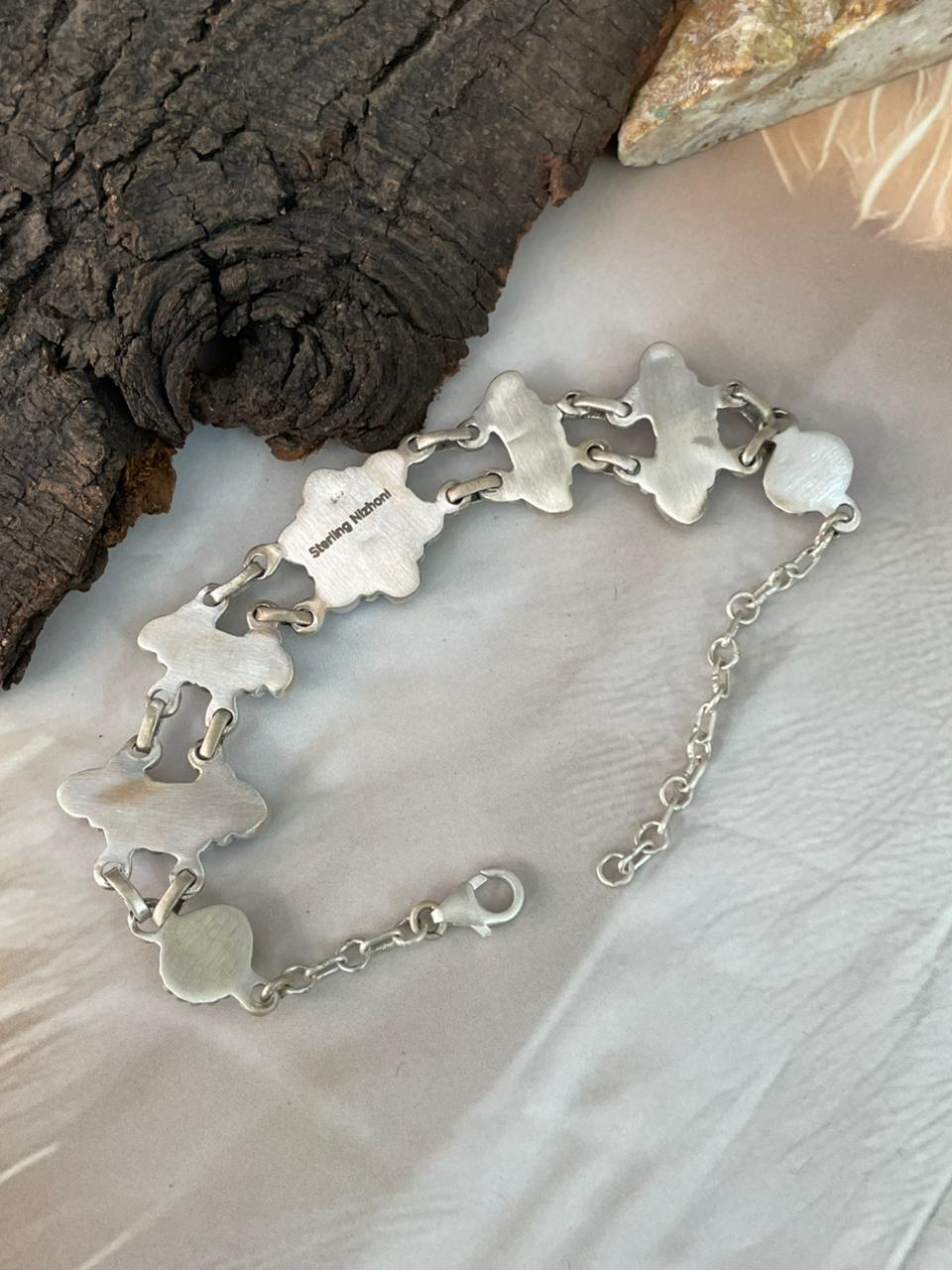 Handmade Sterling Silver White Buffalo with Lapis Bracelet "Signed Nizhoni" (1)
