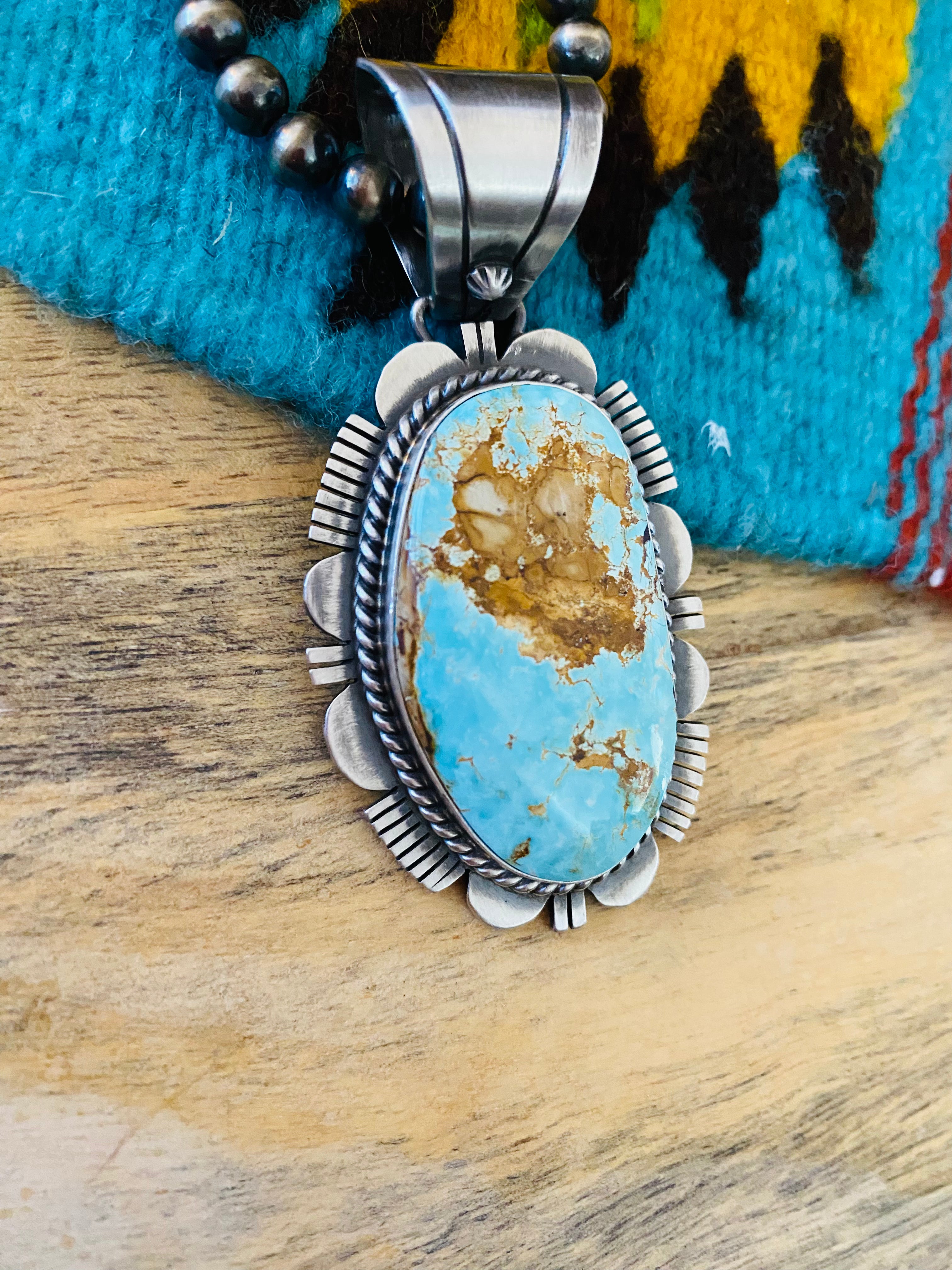 Handcrafted Royston Turquoise and Sterling Silver Pendant by Russell Sam