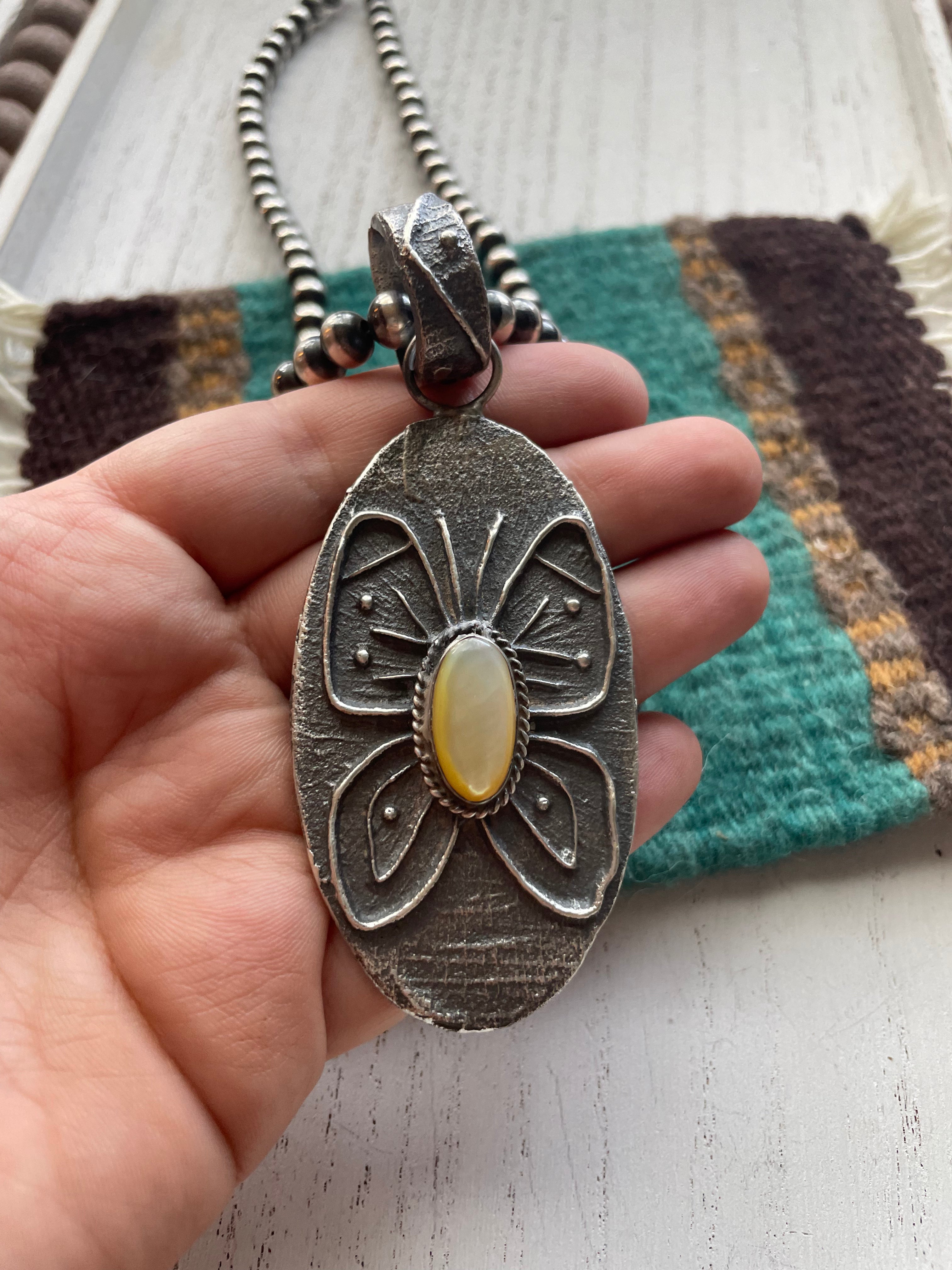 Handcrafted Mother of Pearl & Tufa Cast Butterfly Pendant Signed Wilson Davis
