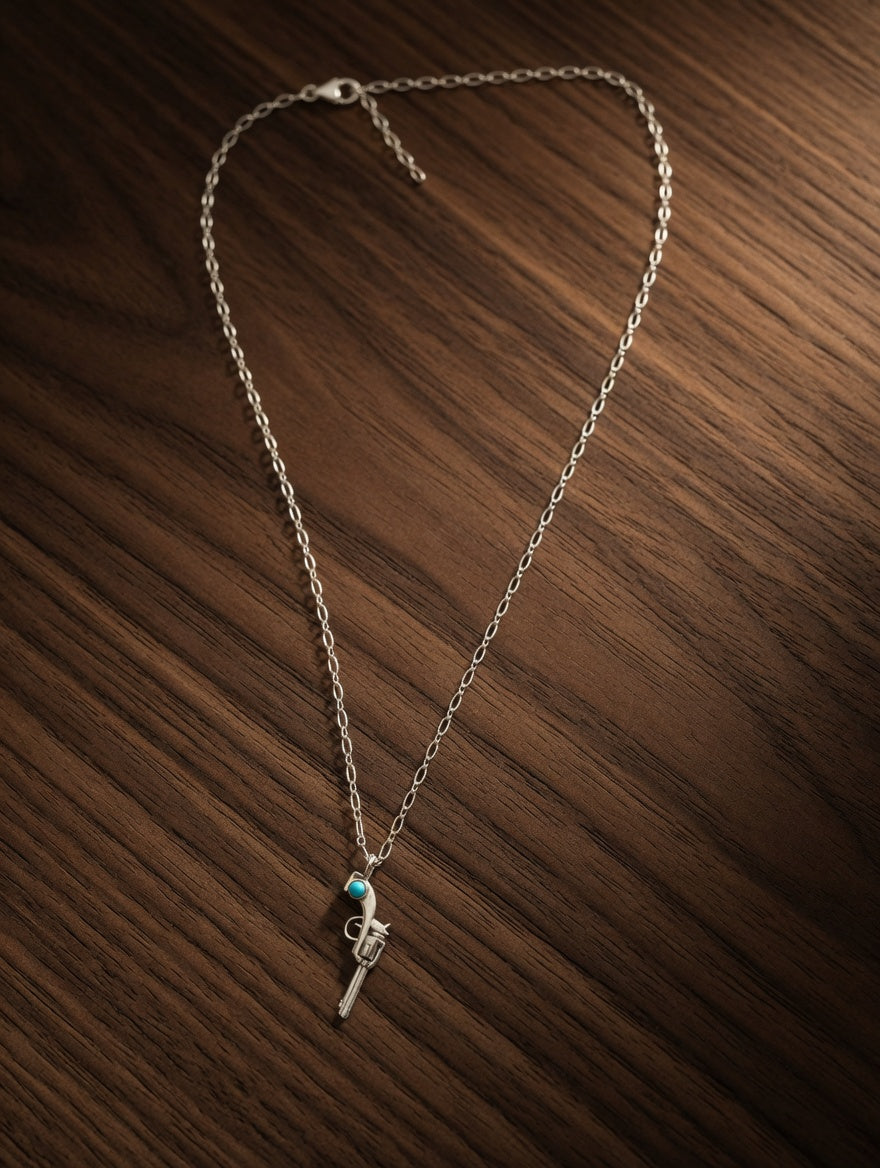 Kingman Turquoise Sterling Silver Necklace With Gun Pendant