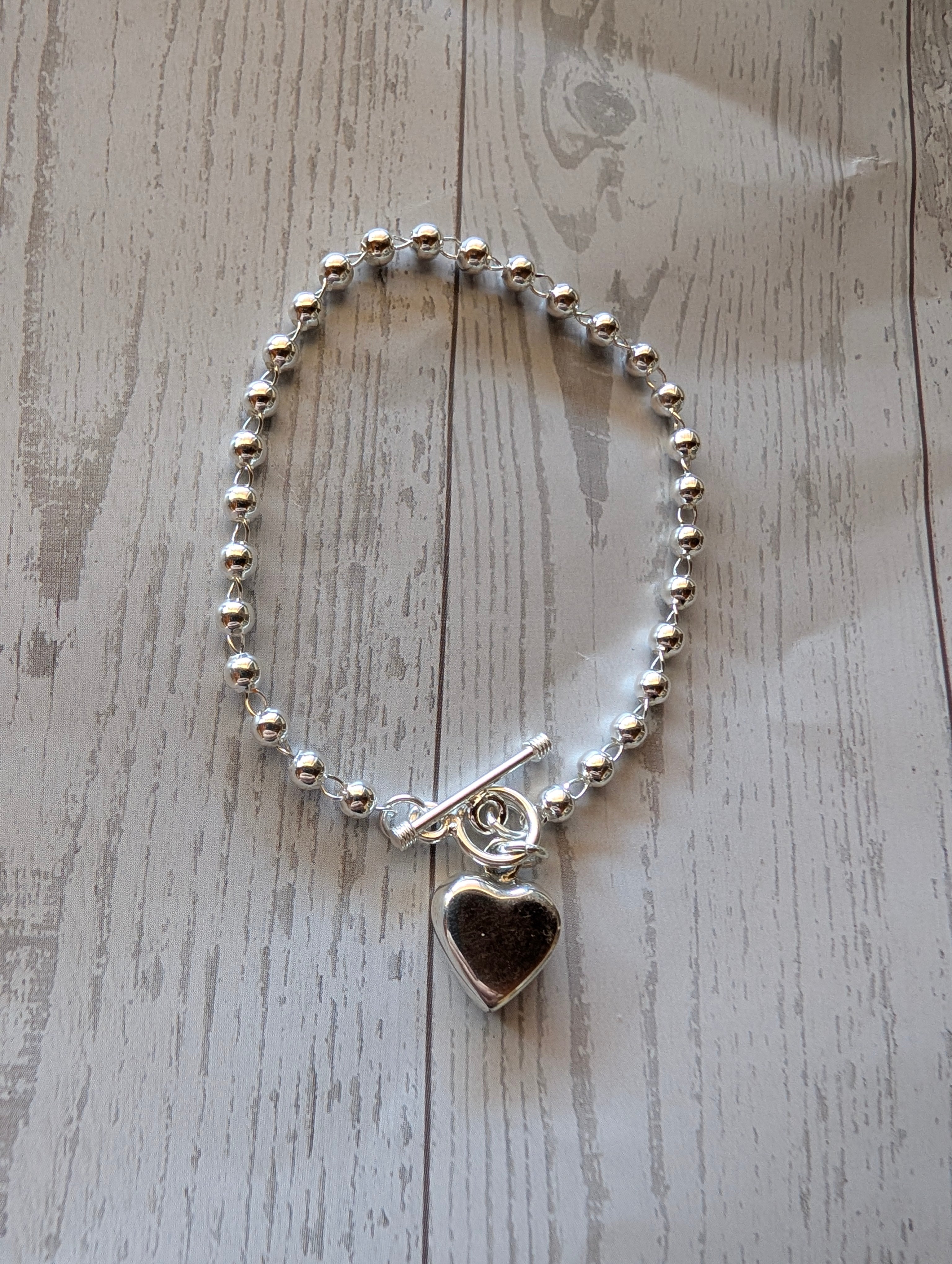 Sterling Silver Beaded Chain Bracelet With Dangling Heart