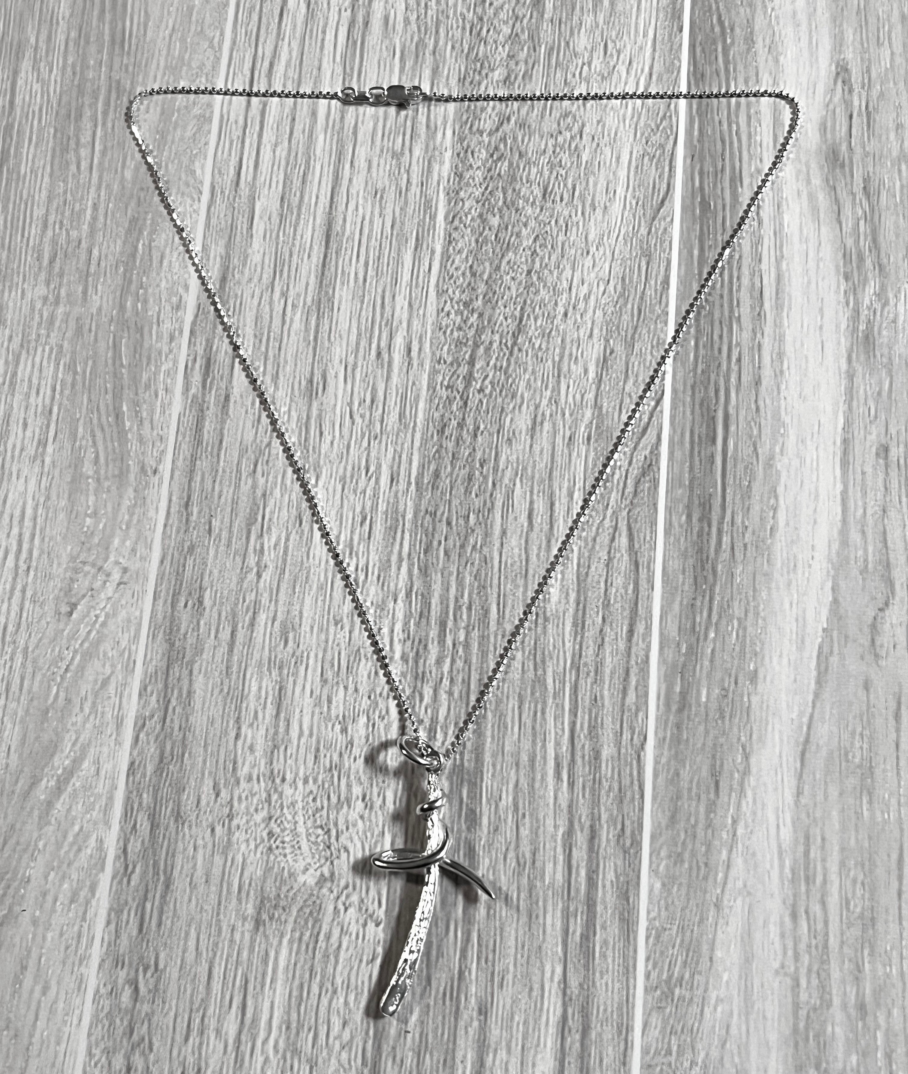 Sterling Silver Textured Cross Necklace With Swirl