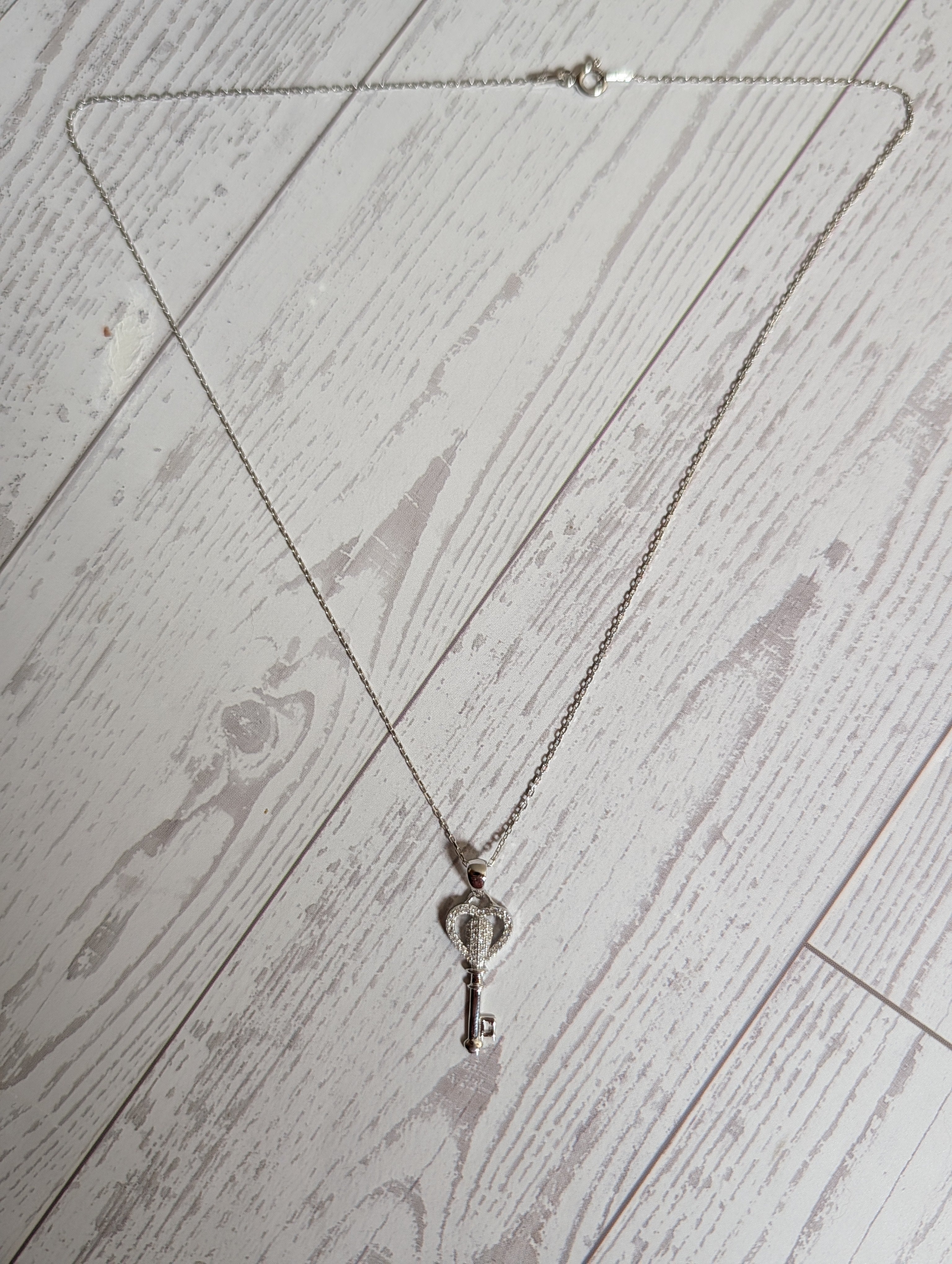 CZ Heart Shaped Key Pendant On Sterling Silver Necklace