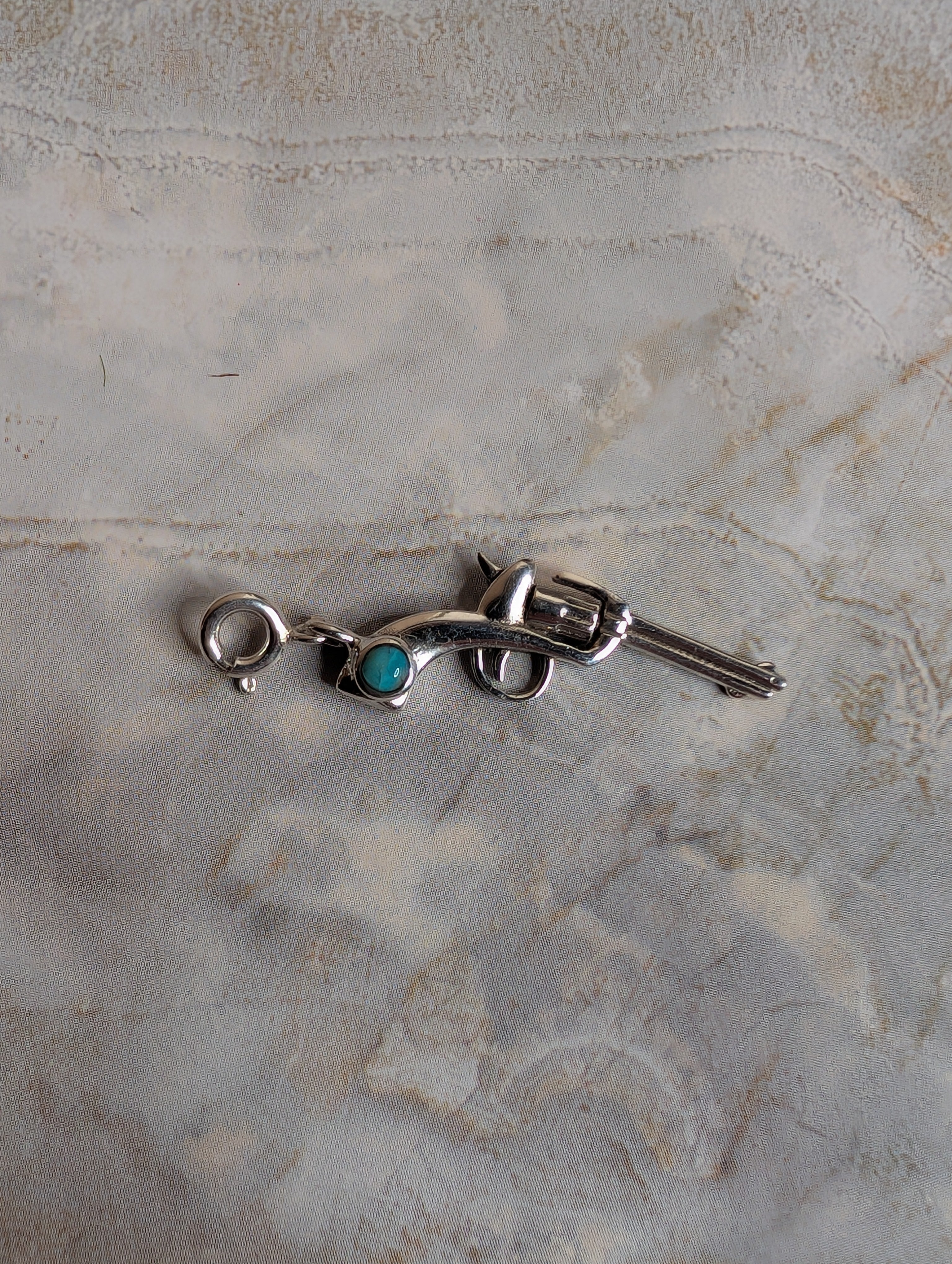 Sterling Silver Gun Charm With Turquoise