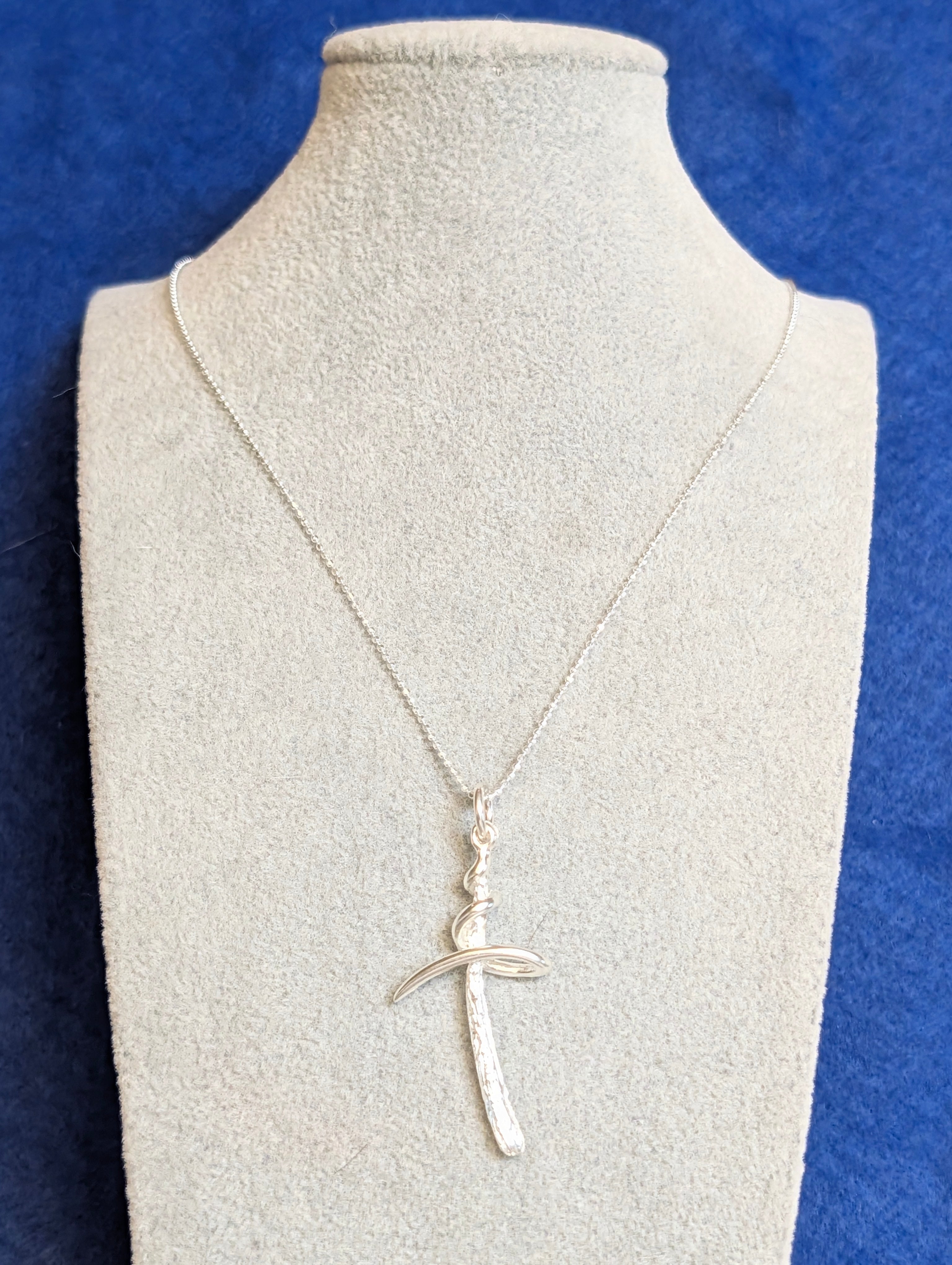 Sterling Silver Textured Cross Necklace With Swirl