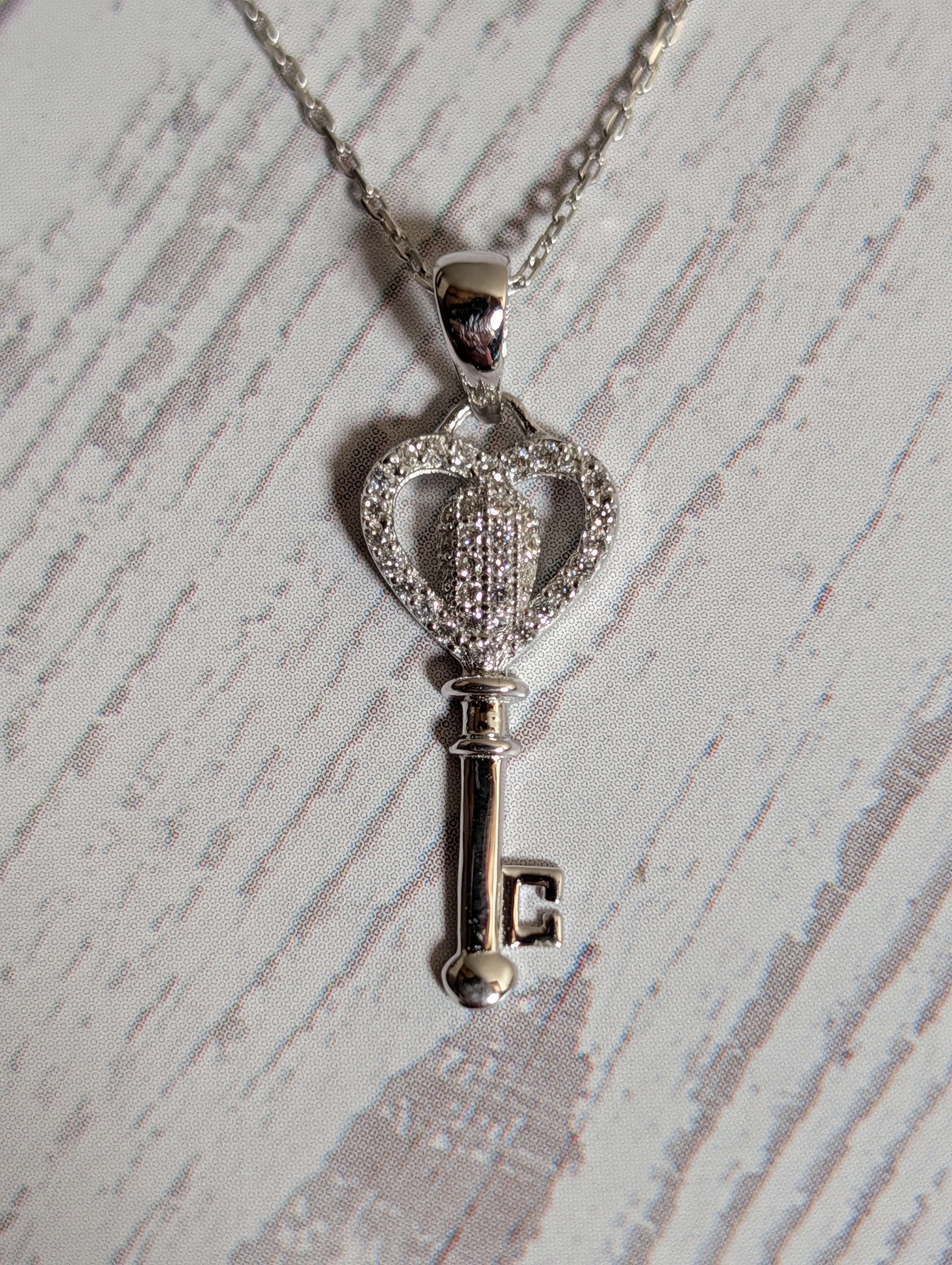 CZ Heart Shaped Key Pendant On Sterling Silver Necklace