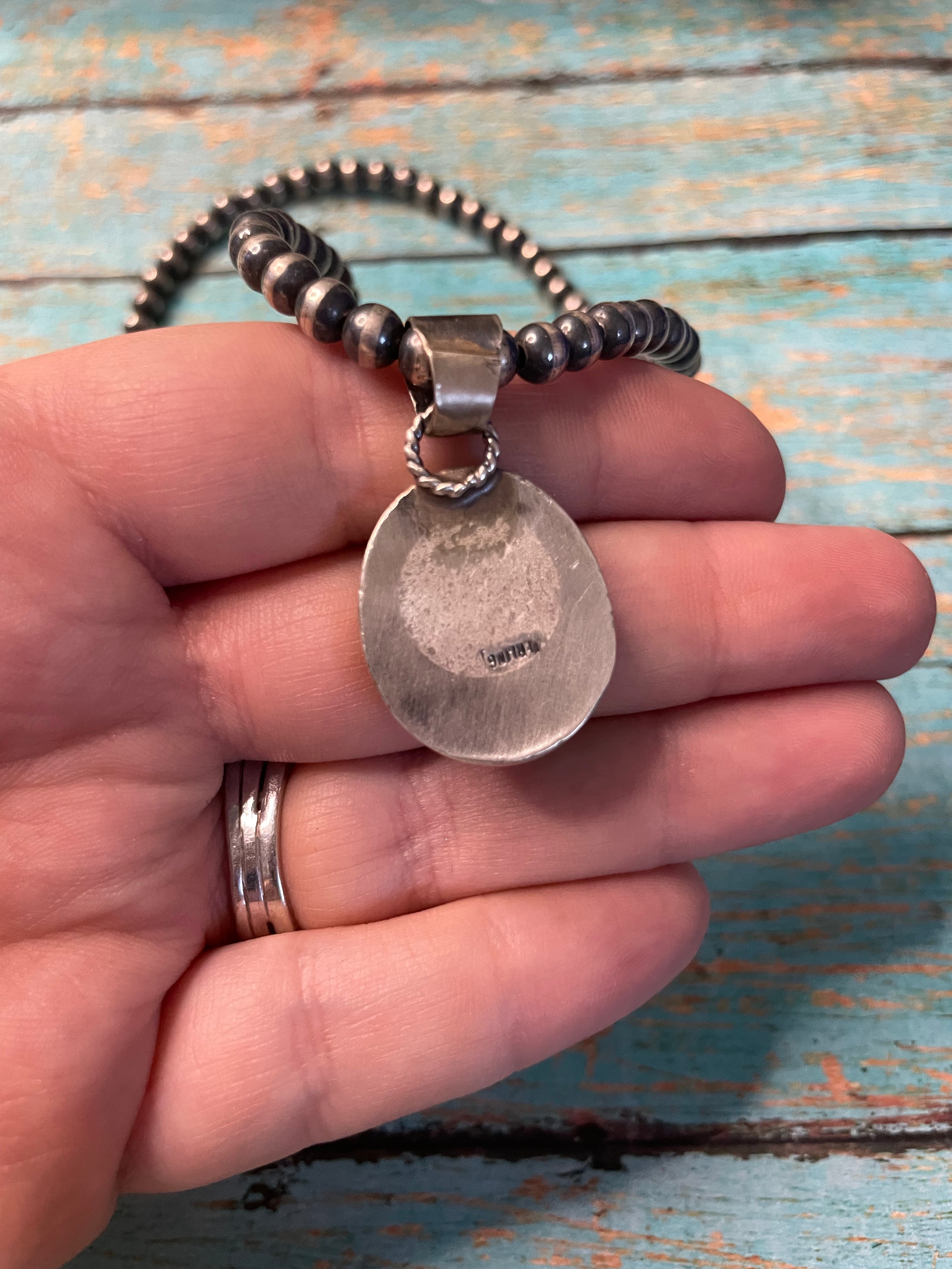 Handcrafted Turquoise And Sterling Silver Pendant