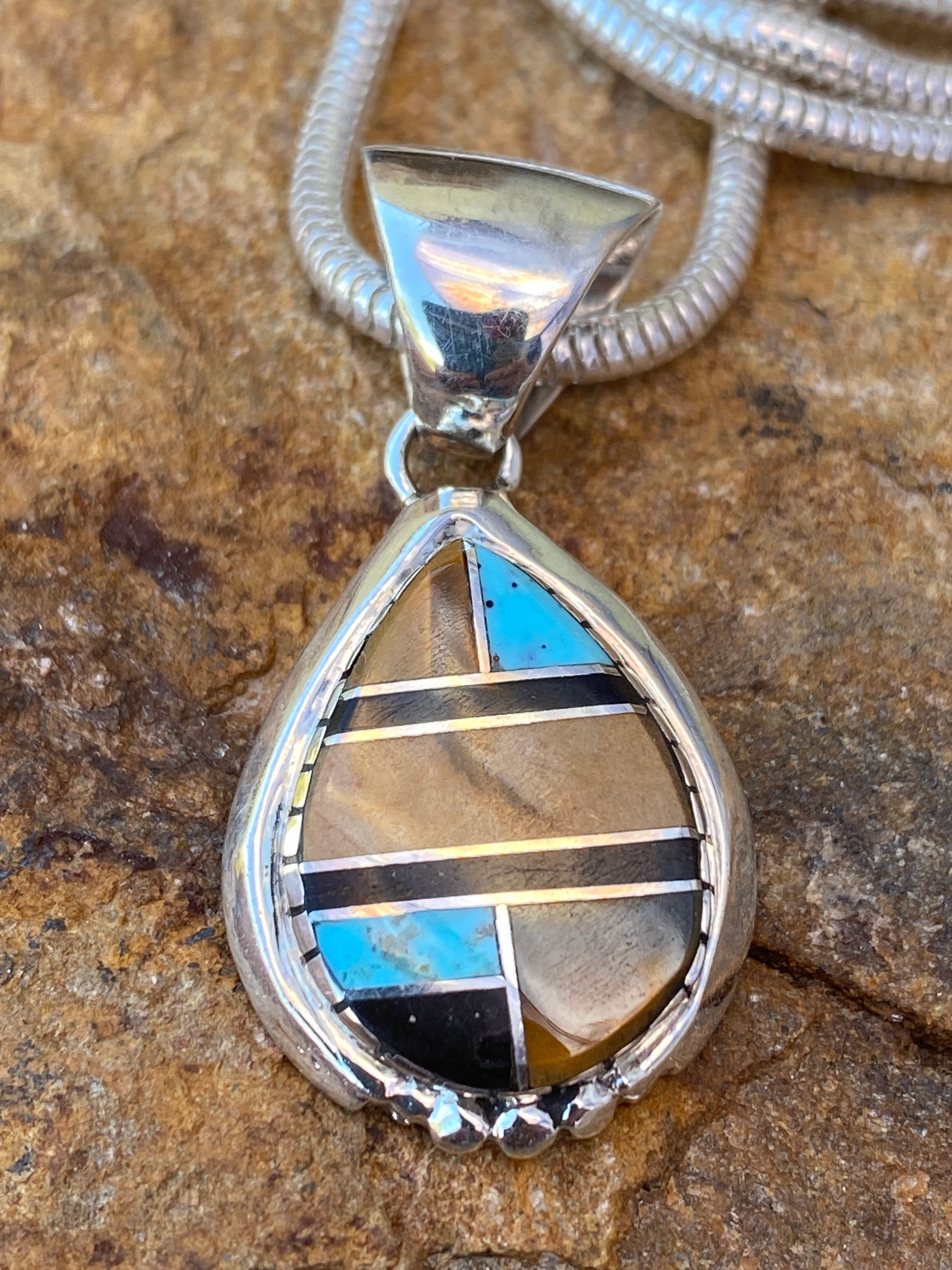 Handcrafted Turquoise petrified wood Pendant
