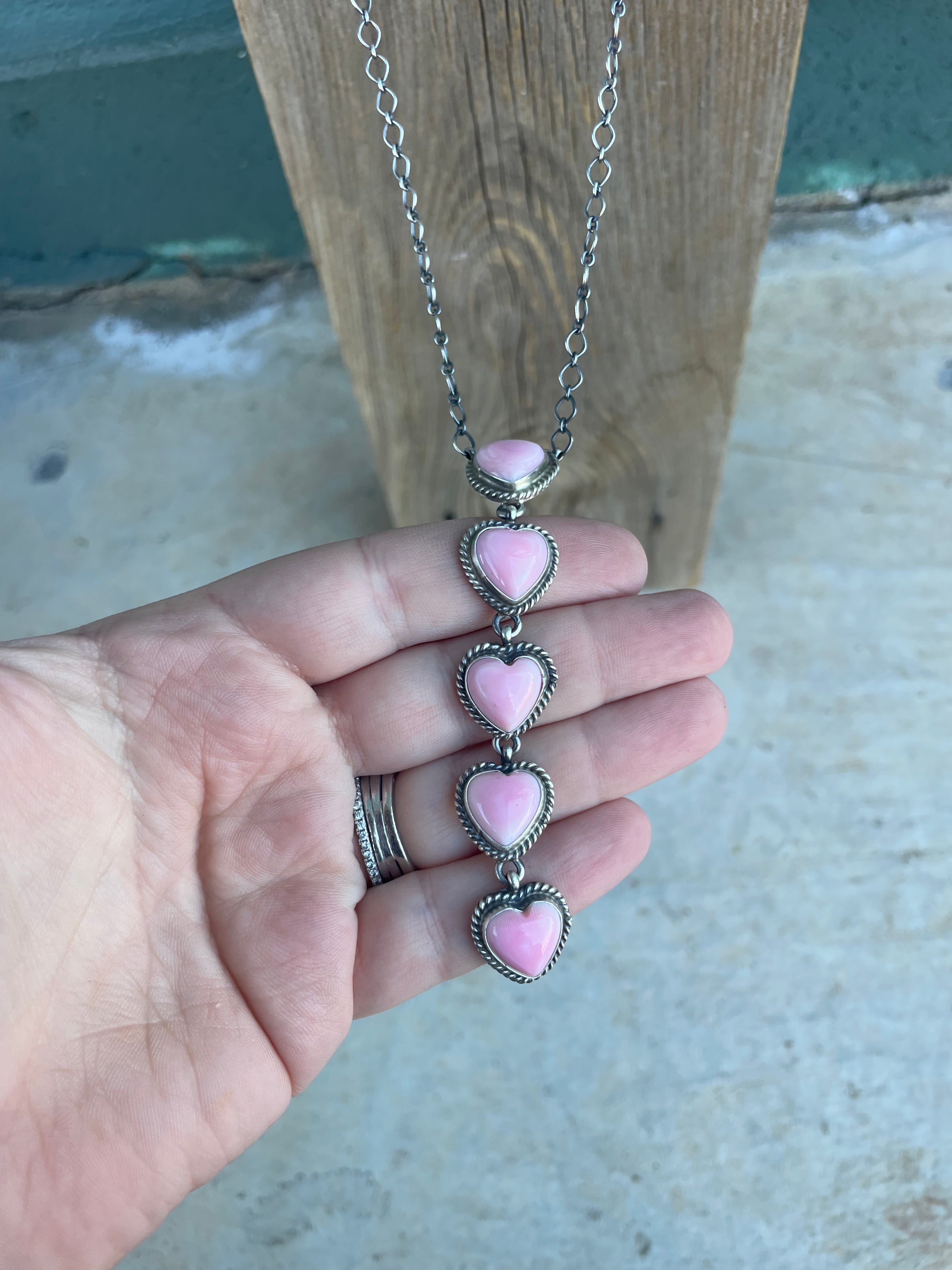Handcrafted Queen Pink Conch Shell And Sterling Silver Drop 5 Heart Necklace by Peggy Skeets