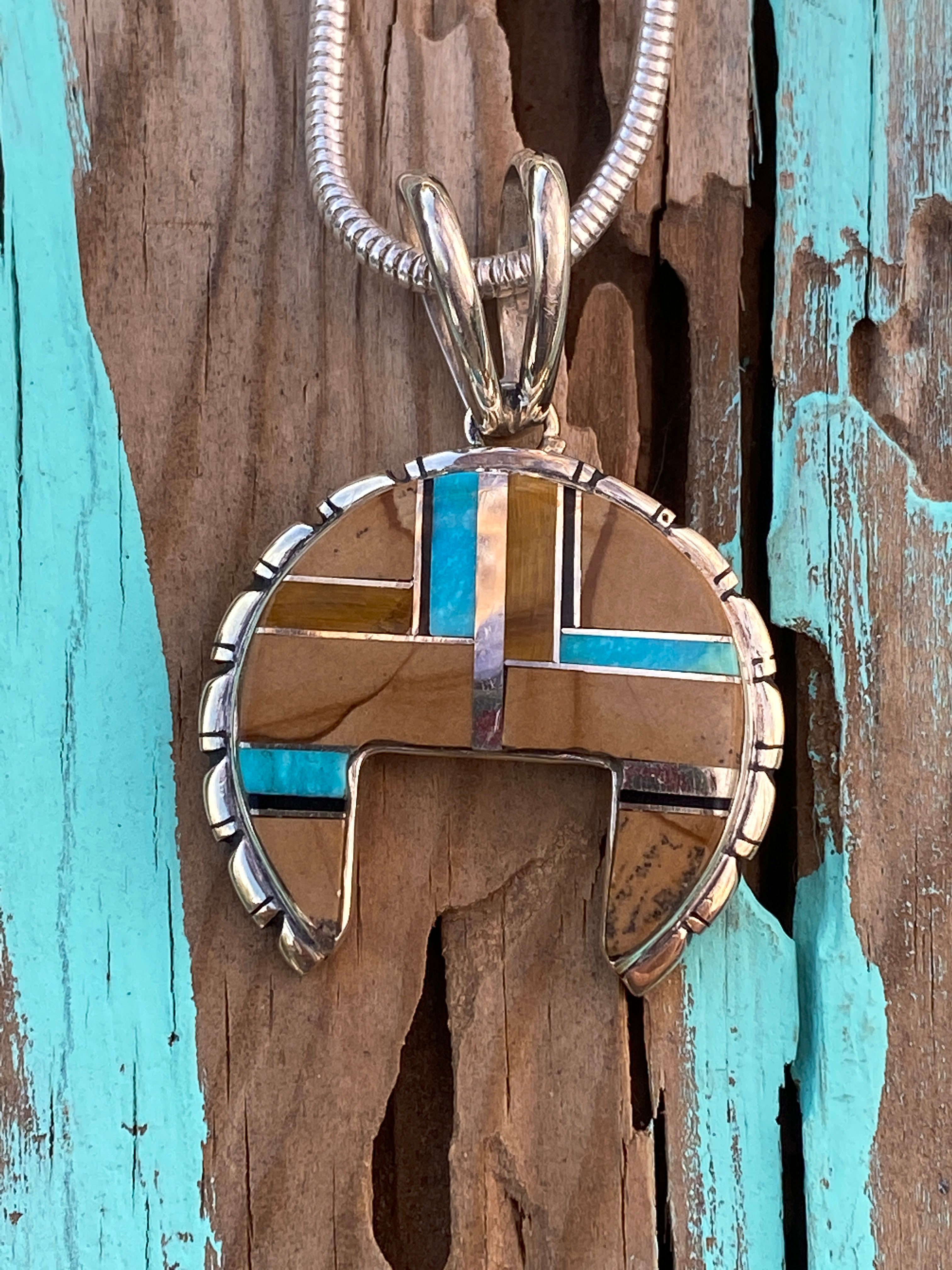 Handcrafted Turquoise, Onyx, Petrified Wood Naja Pendant