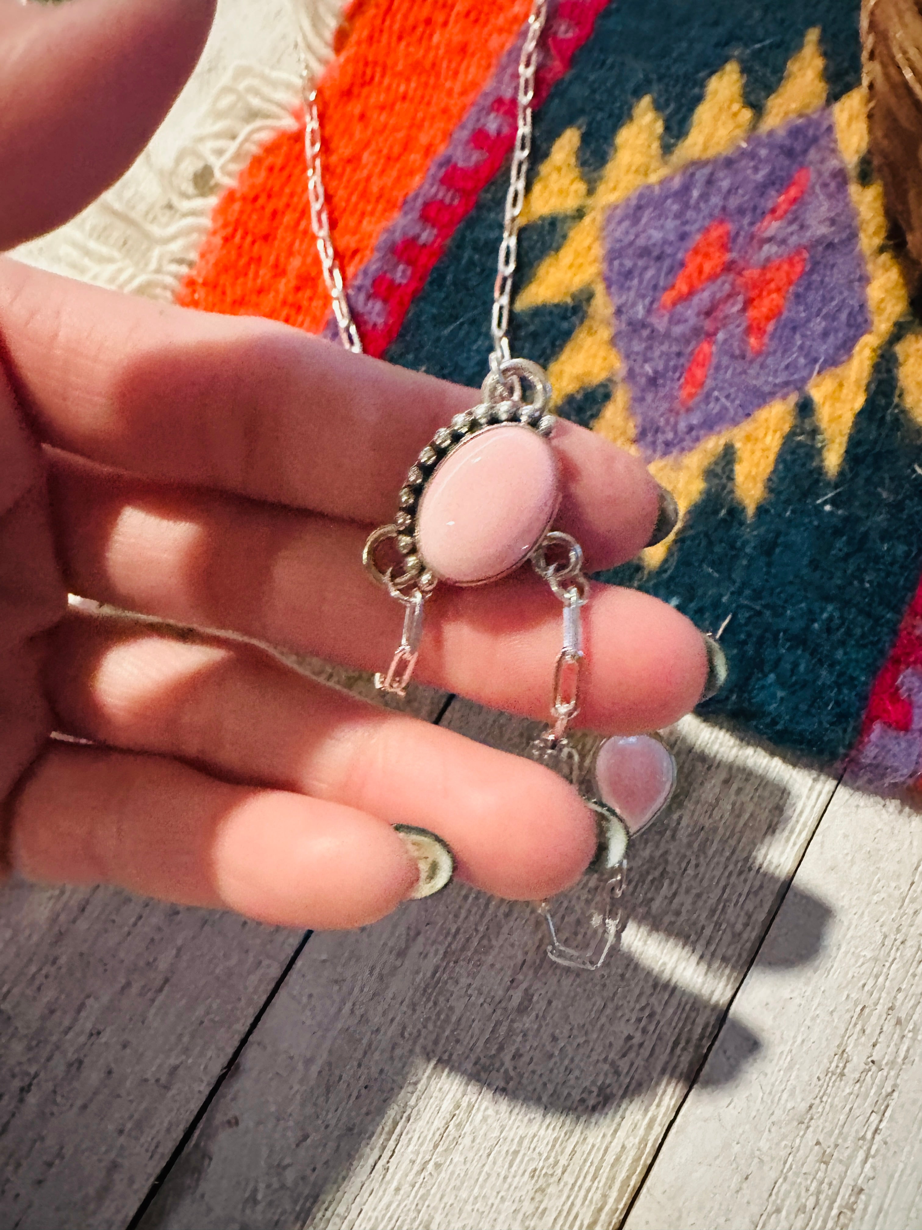 Navajo Queen Pink Conch And Sterling Silver Lariat Drop Necklace