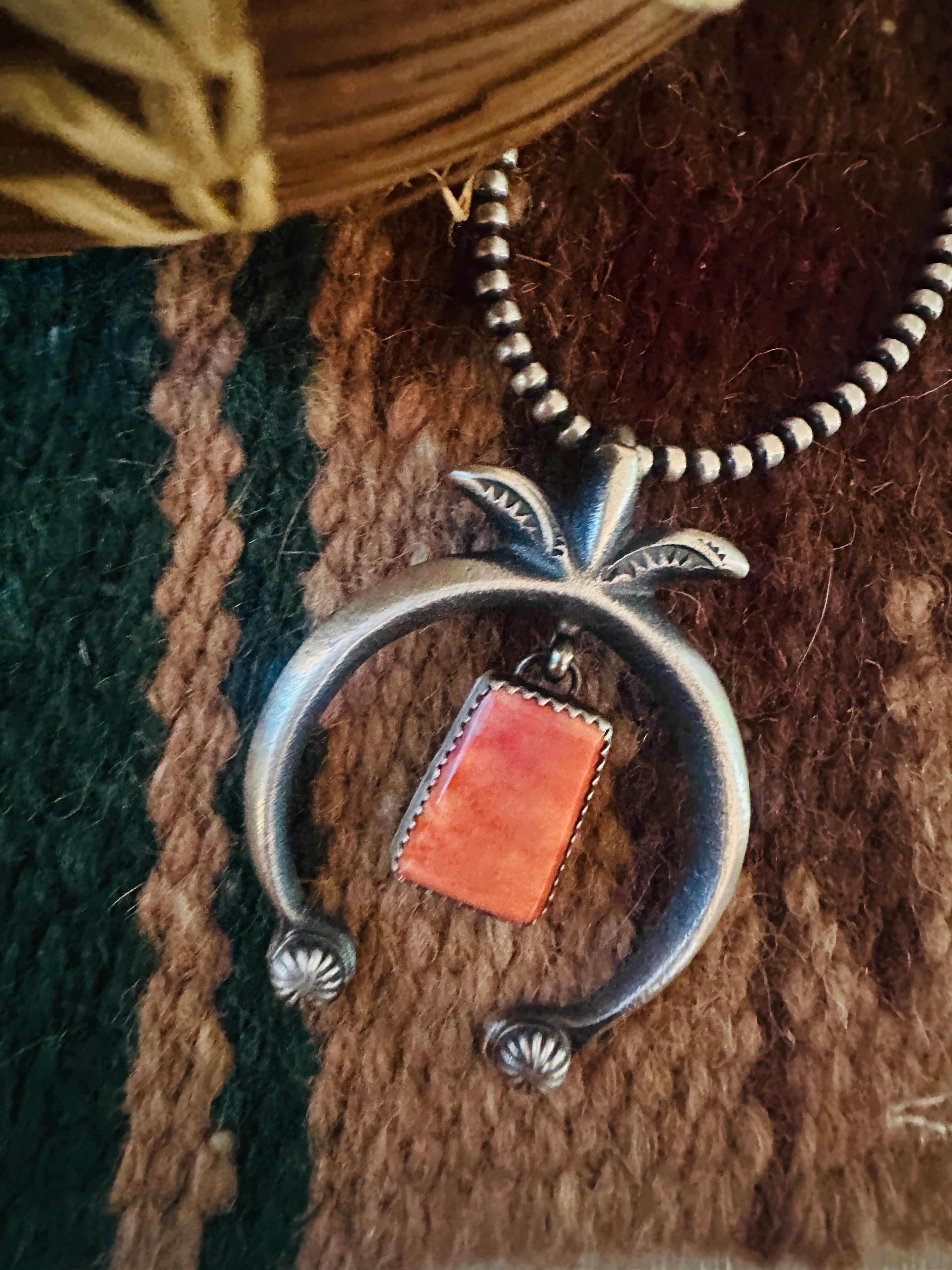 Handcrafted Sterling Silver & Orange Spiny Naja Pendant by Martha Cayatineto