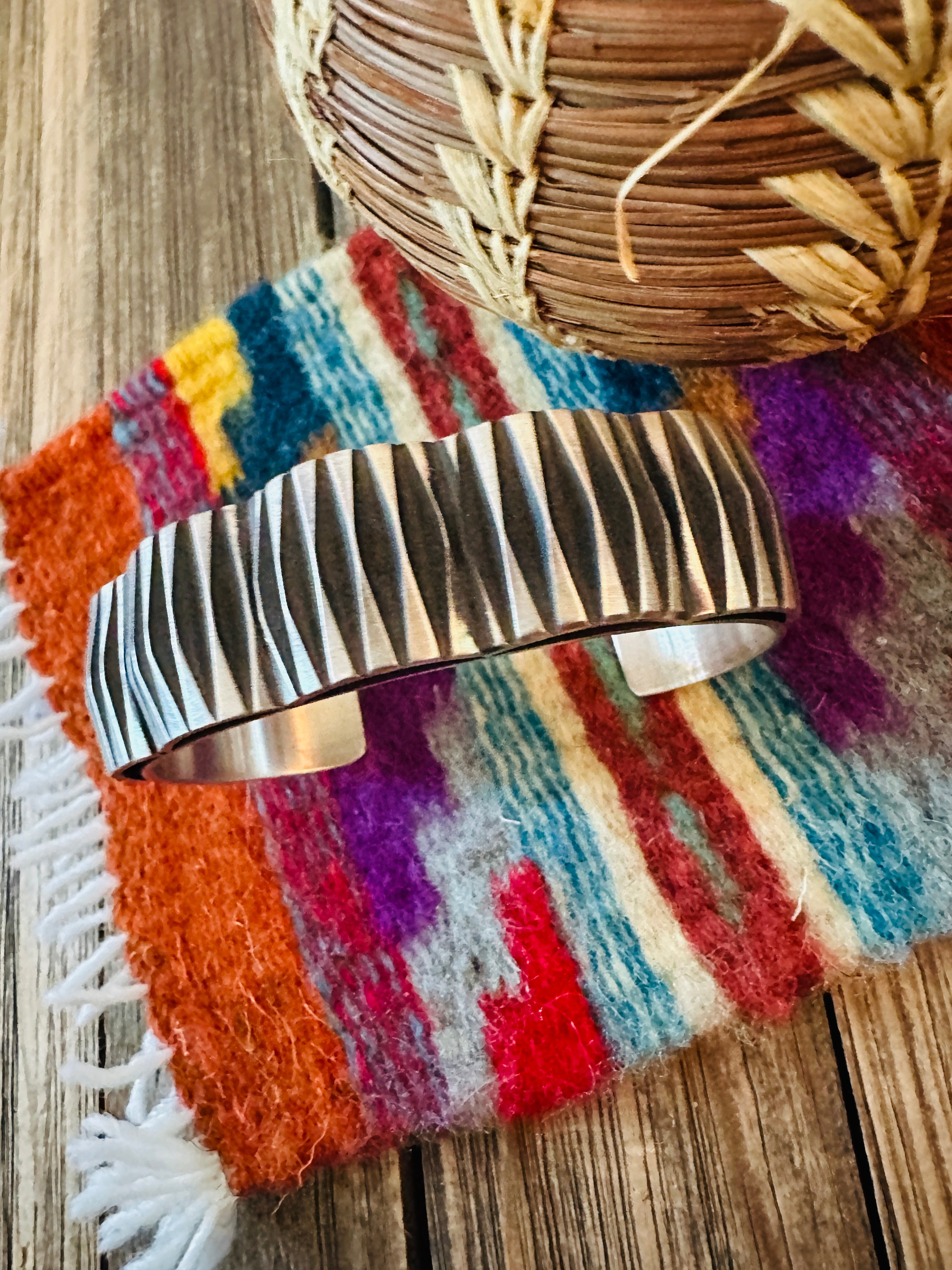 Hand Stamped Sterling Silver Cuff Bracelet by Leander Tahe