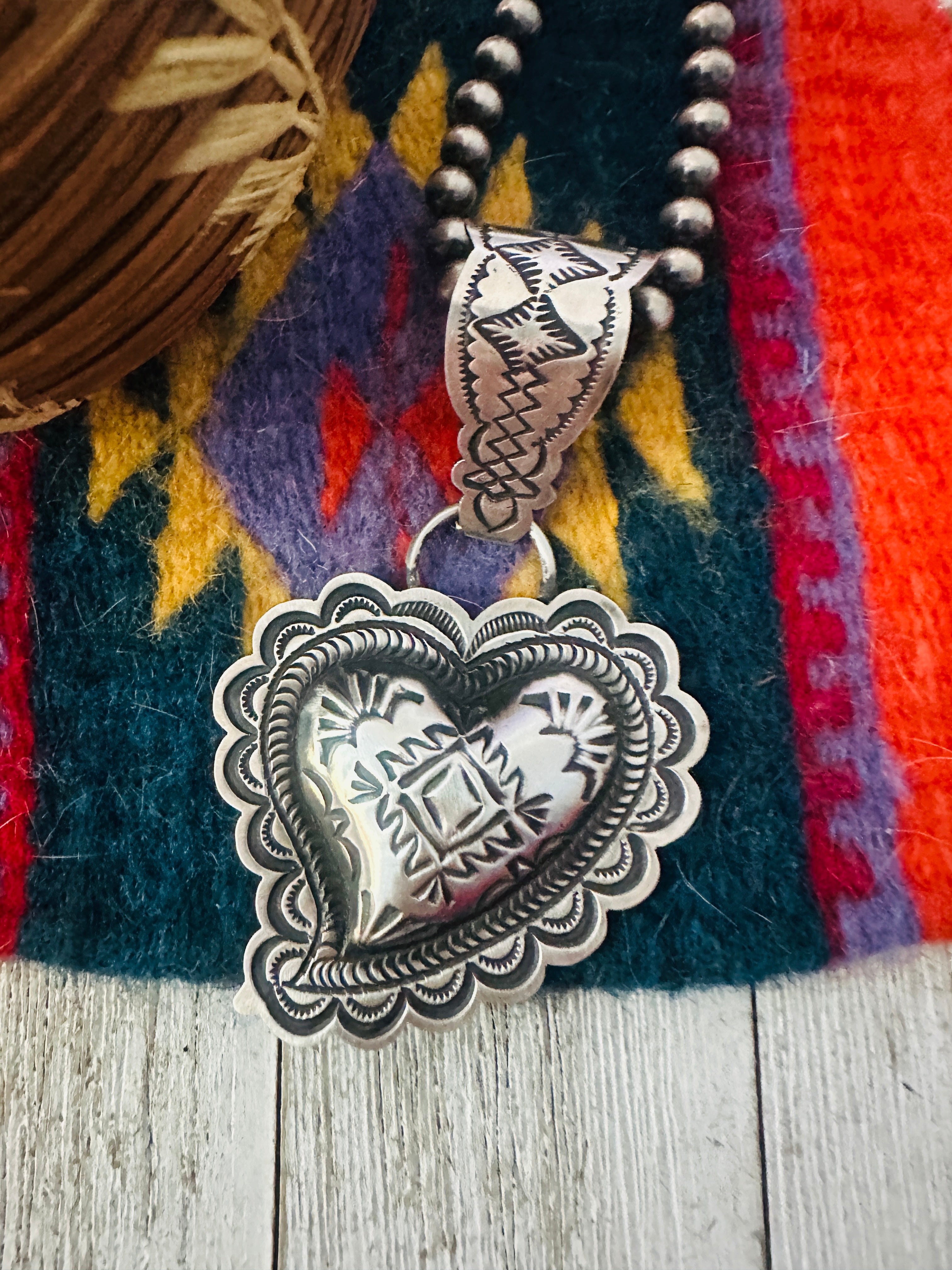 Handcrafted Sterling Silver Heart Concho Pendant by Leander Tahe