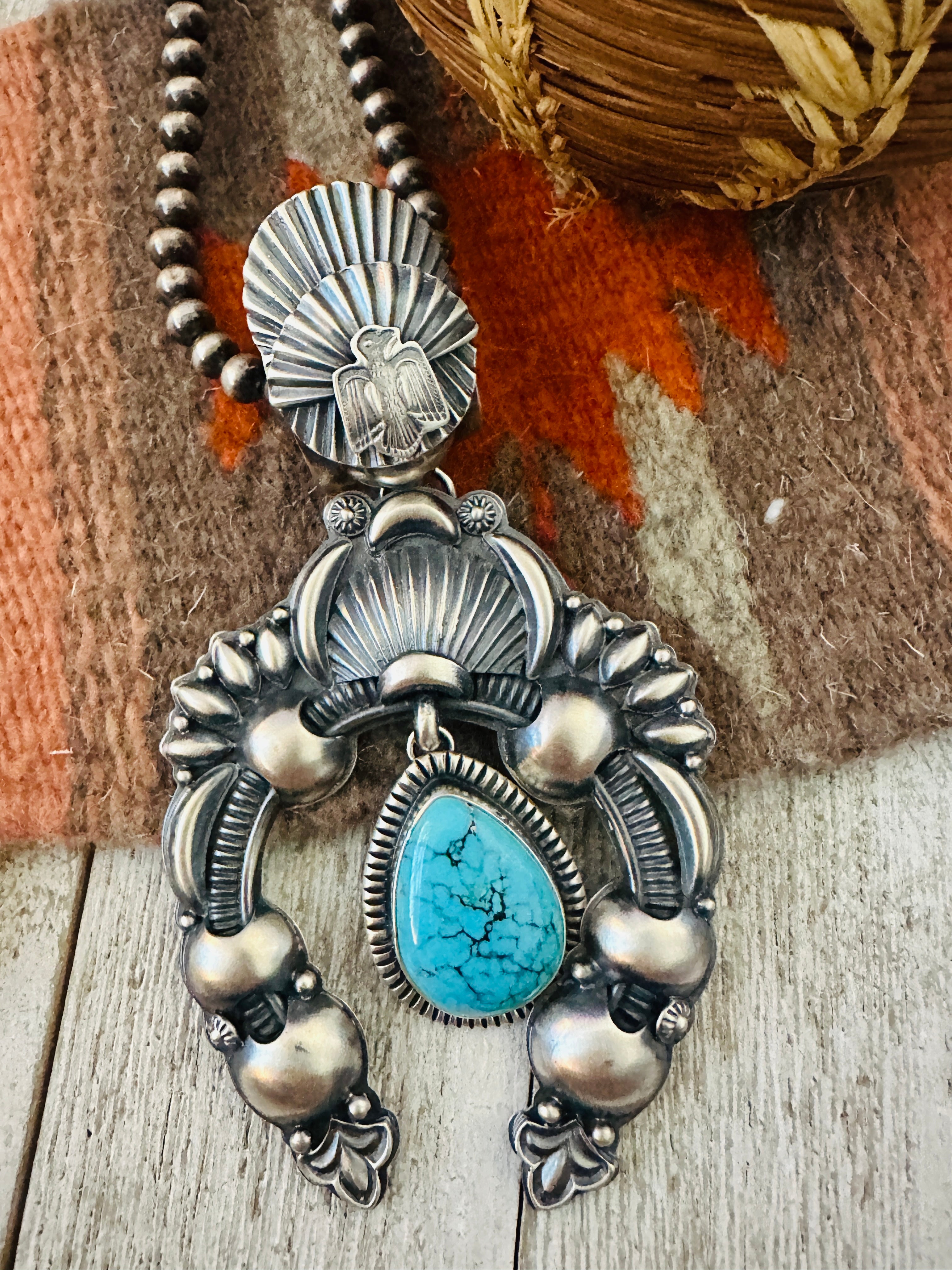 Handcrafted Sterling Silver & Turquoise Naja Pendant by Delbert Gordon
