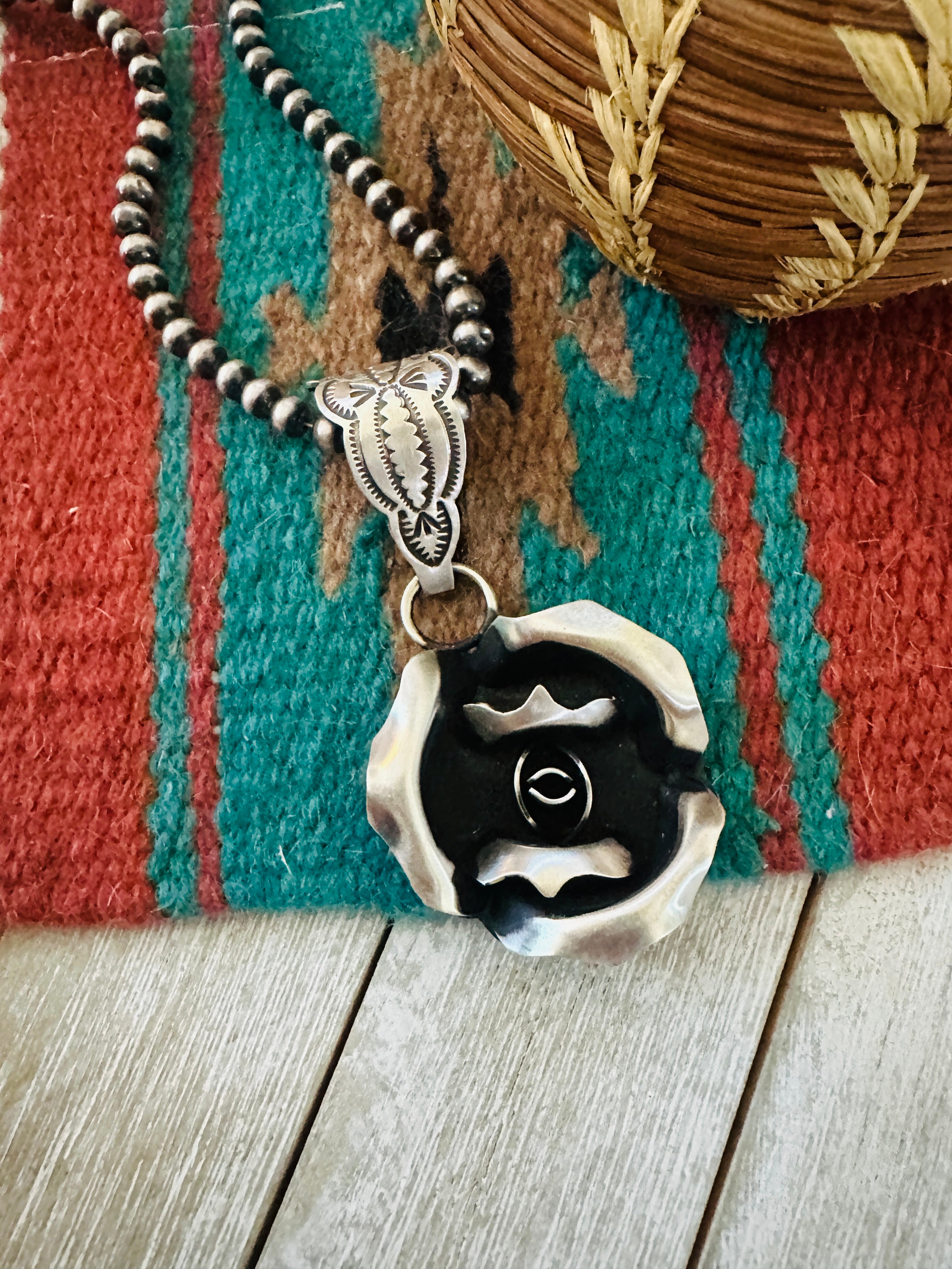 Handcrafted Sterling Silver Rose Pendant by Leander Tahe