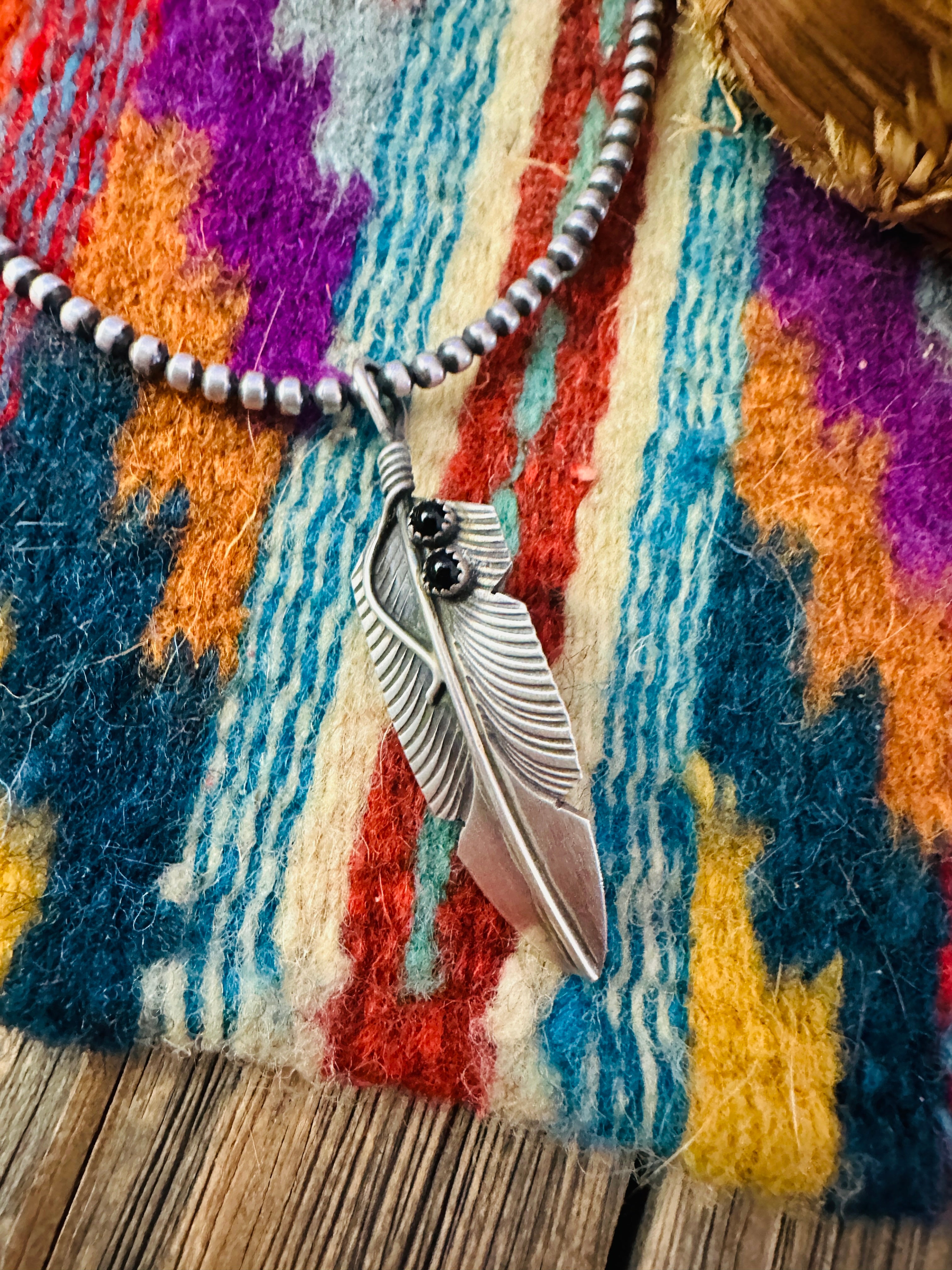 Handcrafted Sterling Silver and Onyx Feather Pendant
