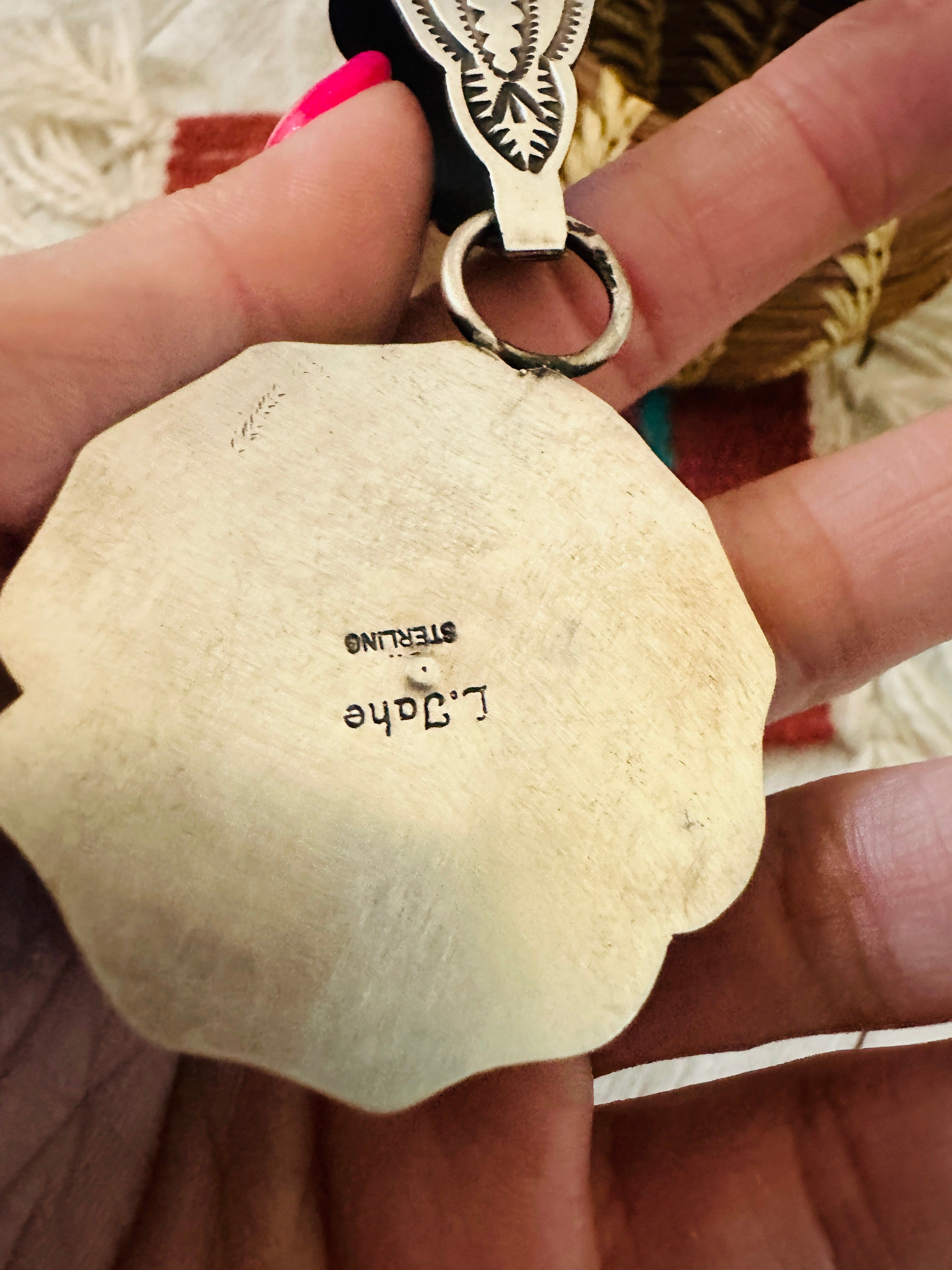 Handcrafted Sterling Silver Rose Pendant by Leander Tahe