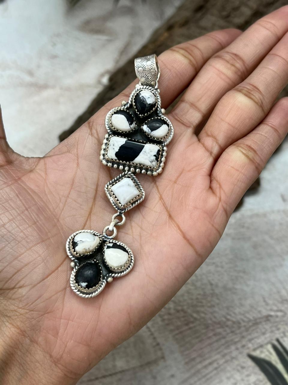 Handmade Sterling Silver White Buffalo Pendant with Signed Nizhoni