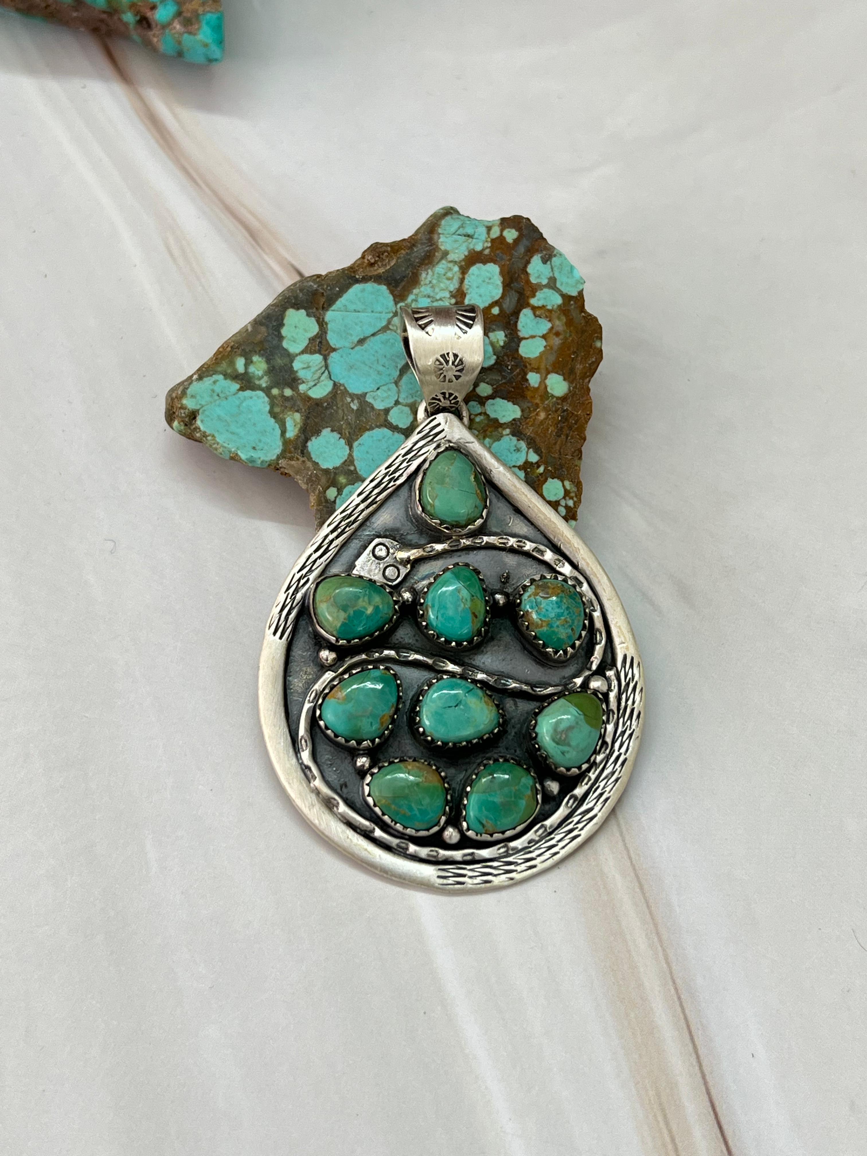 Handmade Sterling Silver Kingman Turquoise Snake Pendant with Signed Nizhoni