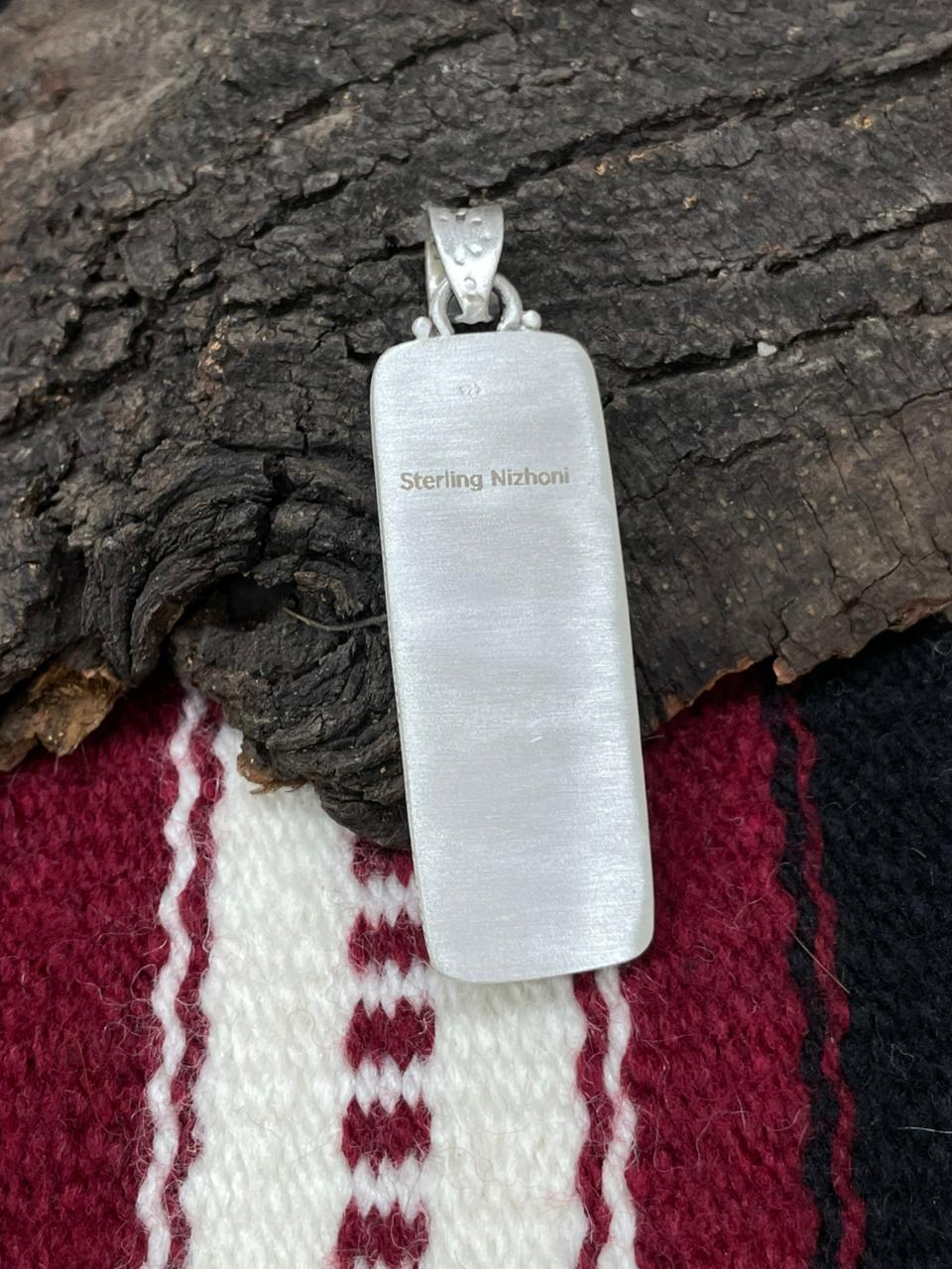 "Christmas Collection" Handmade Sterling Silver Red Opal with White Buffalo Pendant " Signed Nizhoni"