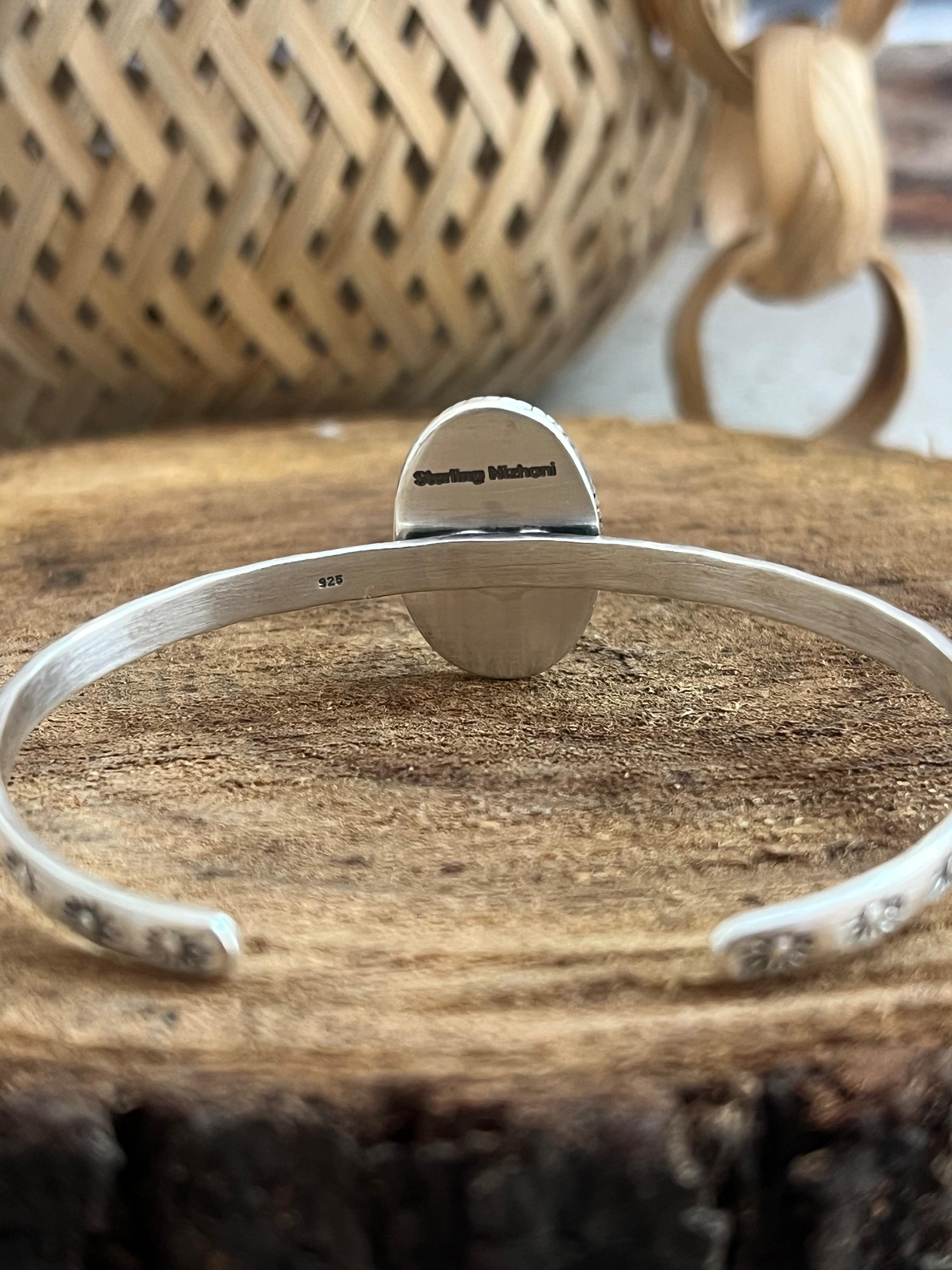 Handmade Sterling Silver White Buffalo Bracelet with Signed Nizhoni