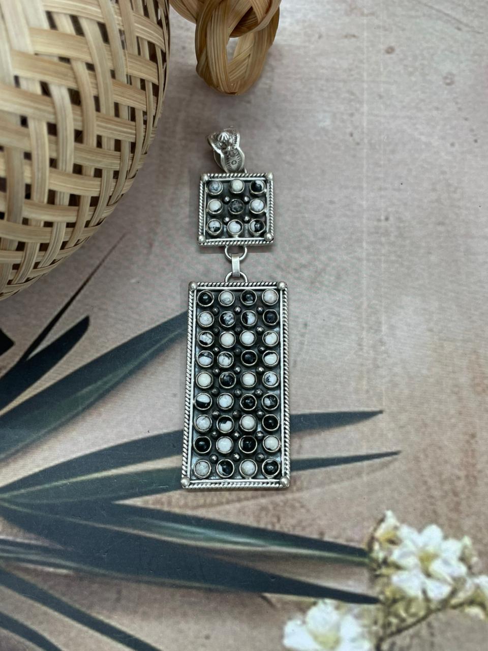 Handmade Sterling Silver White Buffalo Pendant with Signed Nizhoni