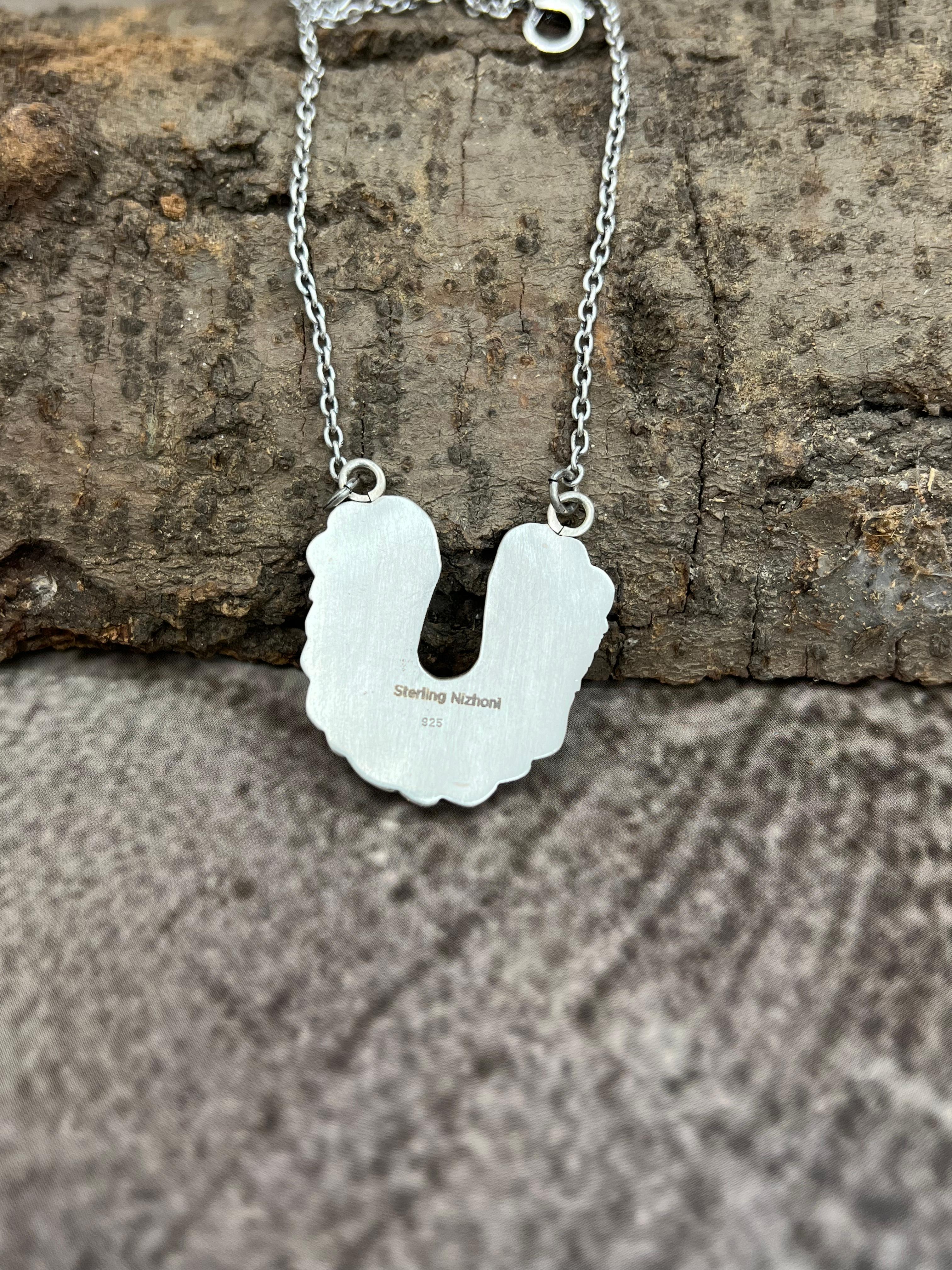 Handmade Sterling Silver White Buffalo Turquoise Necklace with Signed Nizhoni