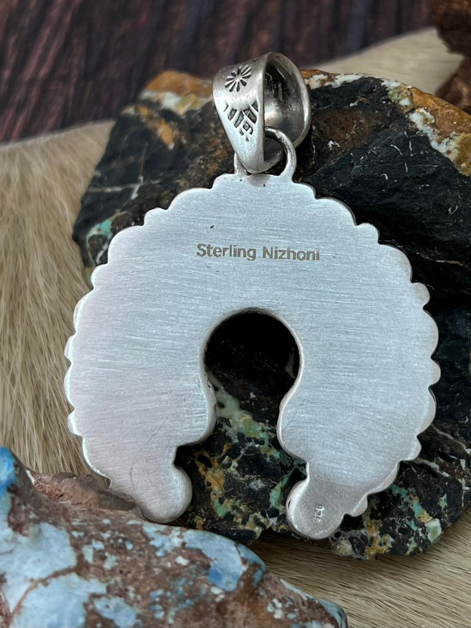 Handmade Sterling Silver White Buffalo Naja Pendant "Signed Nizhoni"