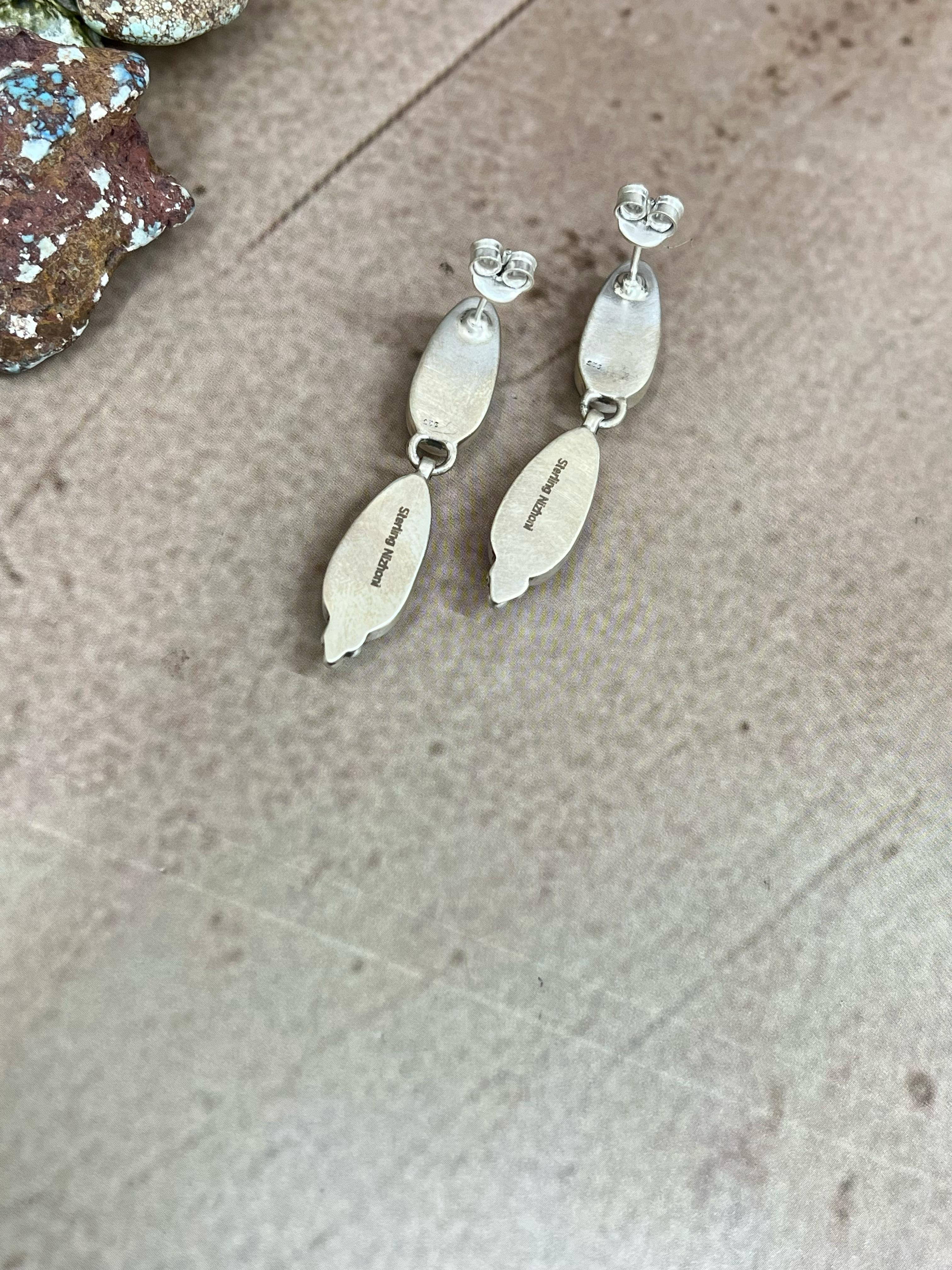 Handmade Sterling Silver White Buffalo Turquoise Dangle Earrings with Signed Nizhoni