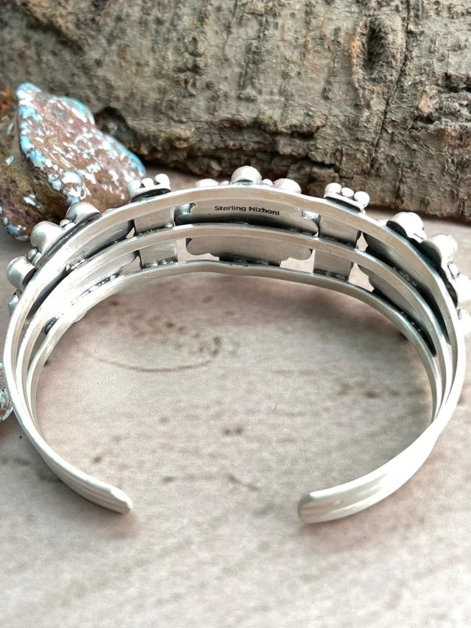 Handmade Sterling Silver White Buffalo Cuff Bracelet with Signed Nizhoni