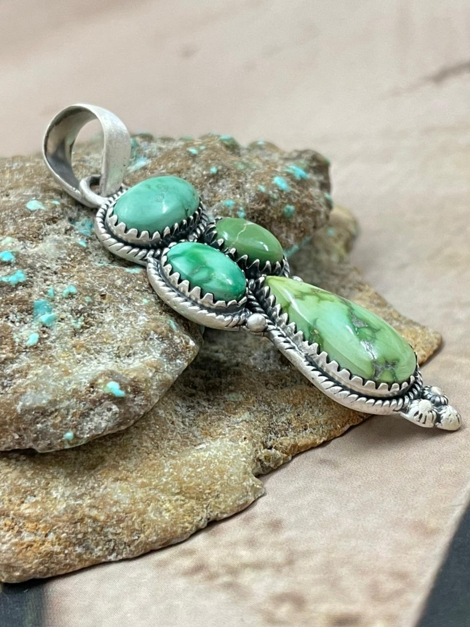 Handmade Sterling Silver Emerald Valley Pendant with Signed Nizhoni