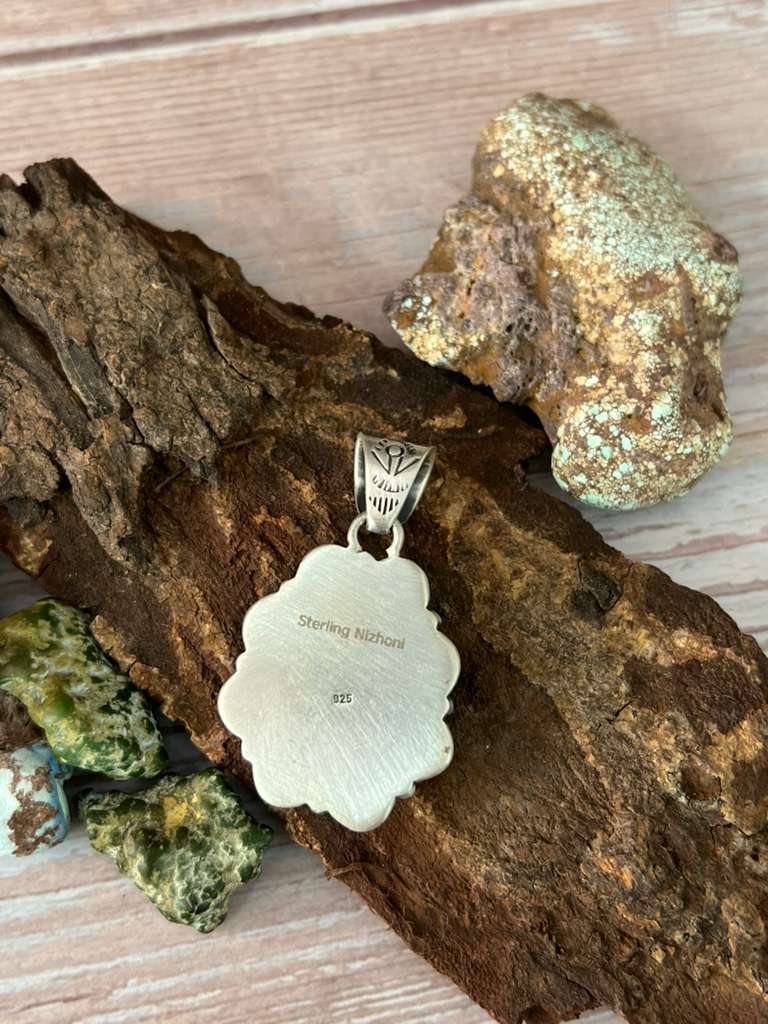 Handmade Sterling Silver White Buffalo Turquoise Pendant with Signed Nizhoni