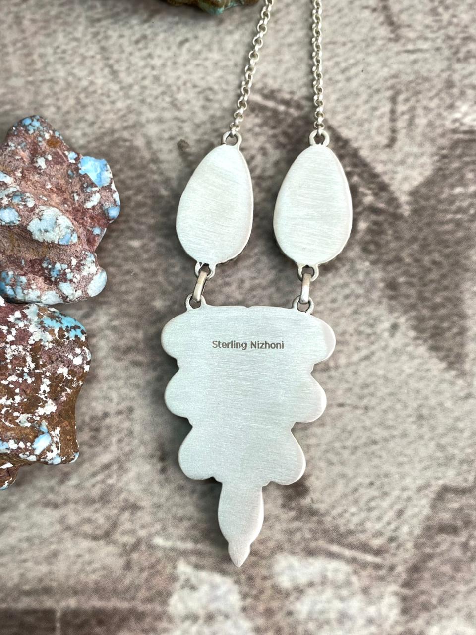 Handmade Sterling Silver White Buffalo Necklace with Signed Nizhoni