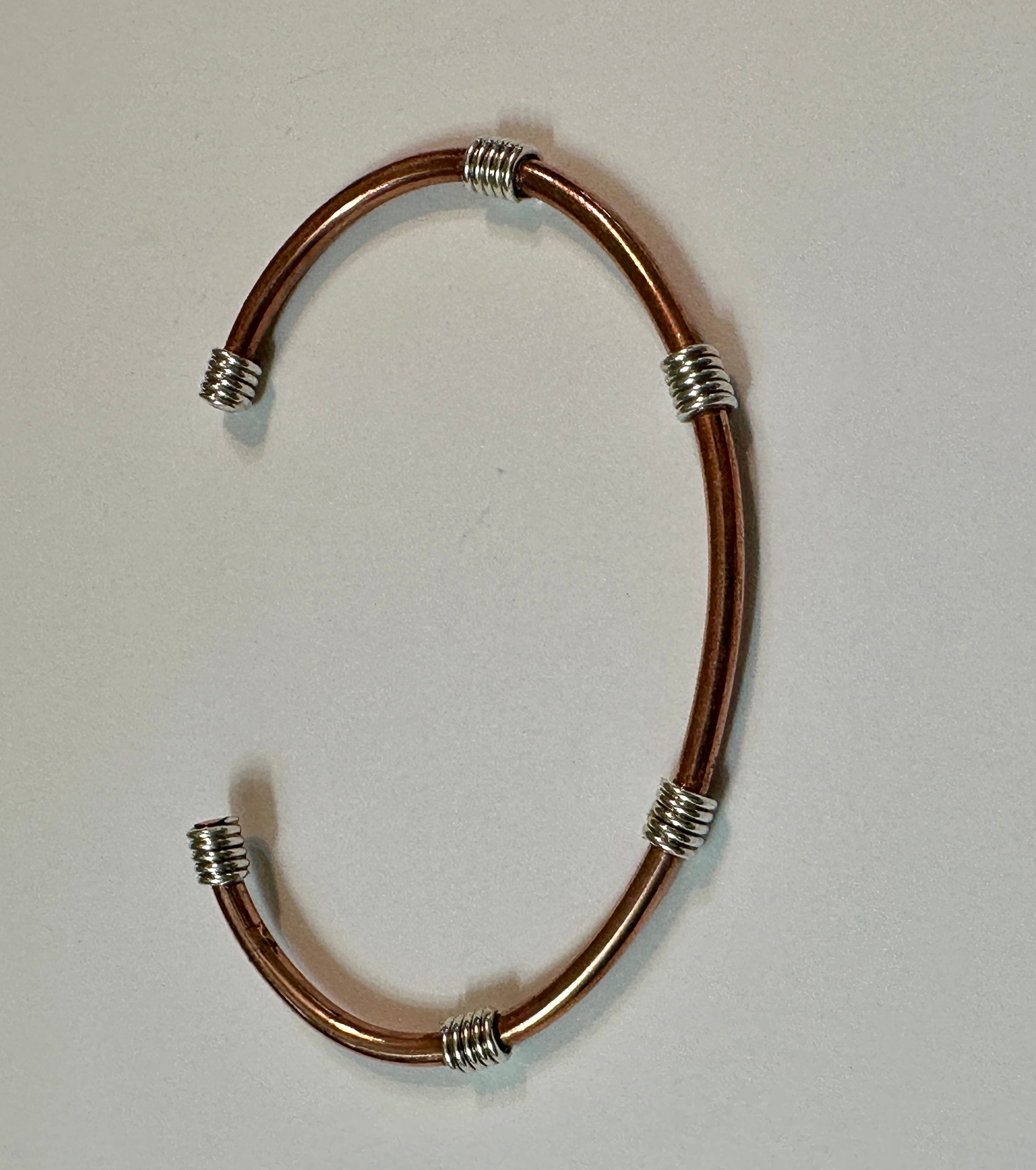 SIMPLE COPPER CUFF W/ STERLING SILVER COILS