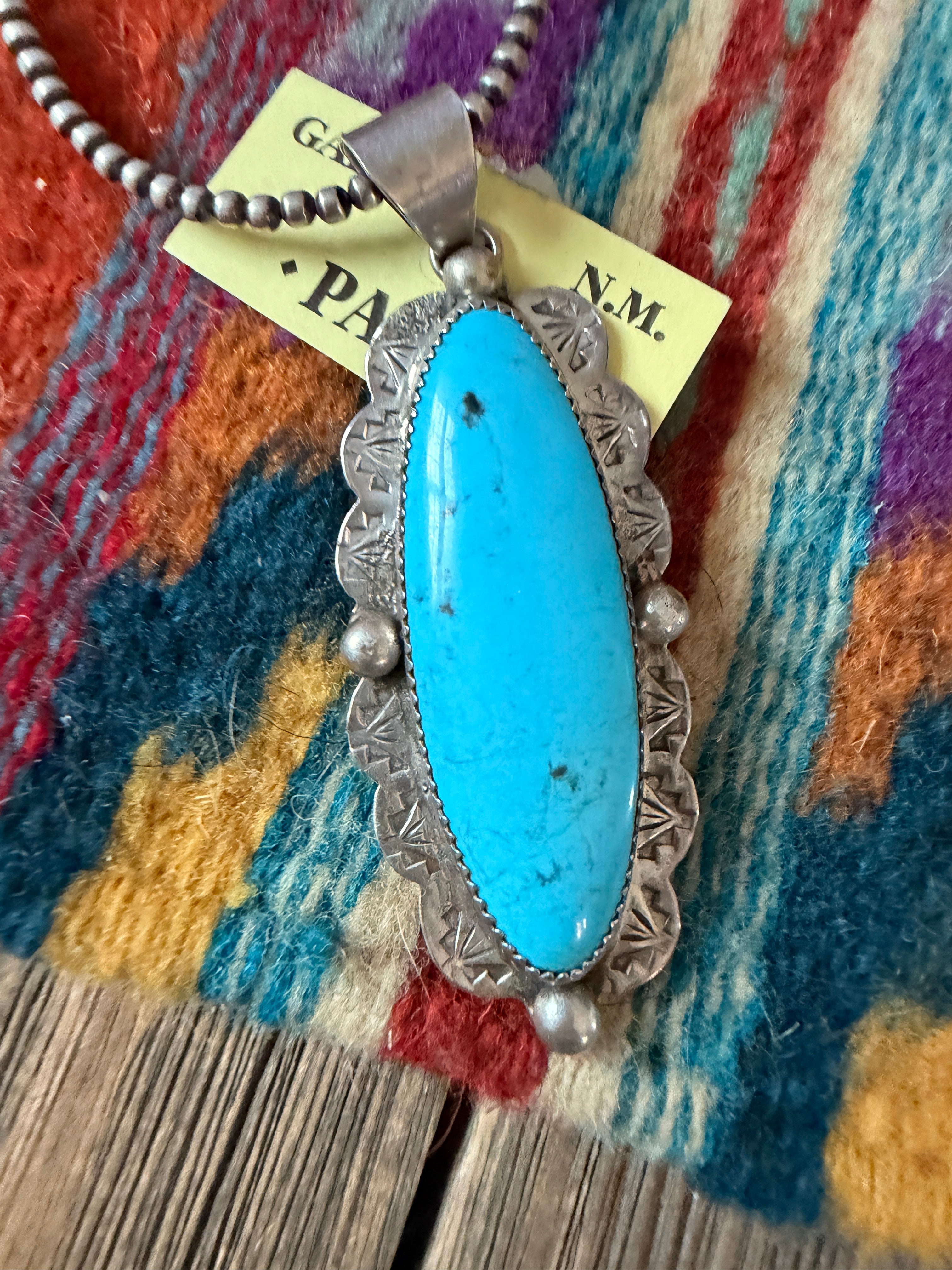 Old Pawn Handcrafted Turquoise and Sterling Silver Pendant